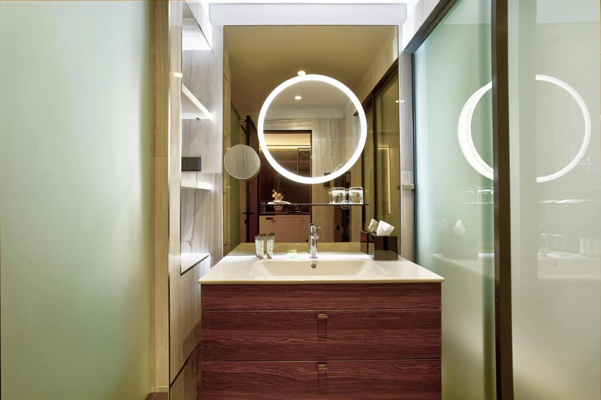 Bathroom in Emerald Downtown Luxury Suites by Continental Group
