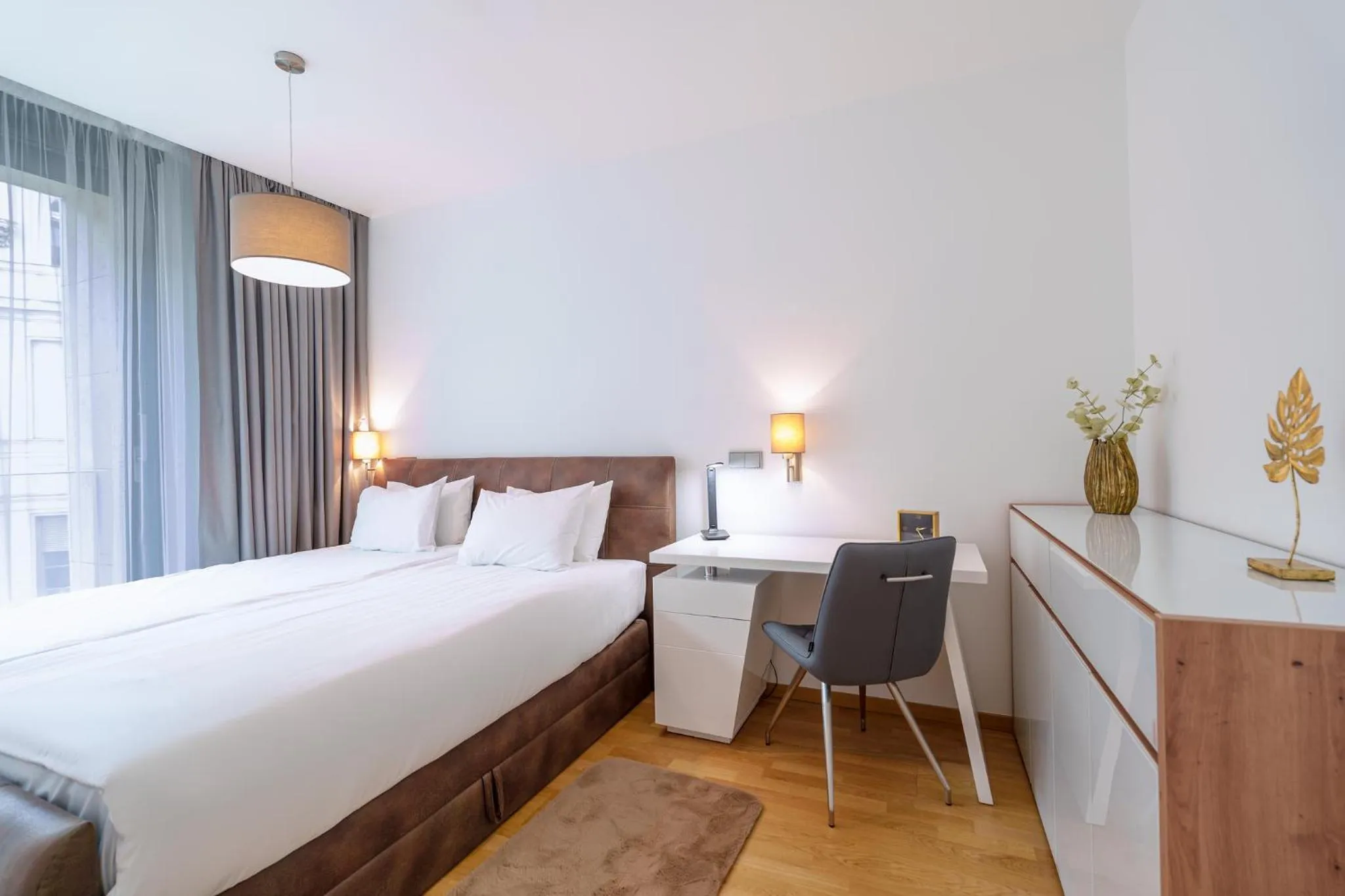 Bedroom, Bed in Emerald Downtown Luxury Suites by Continental Group