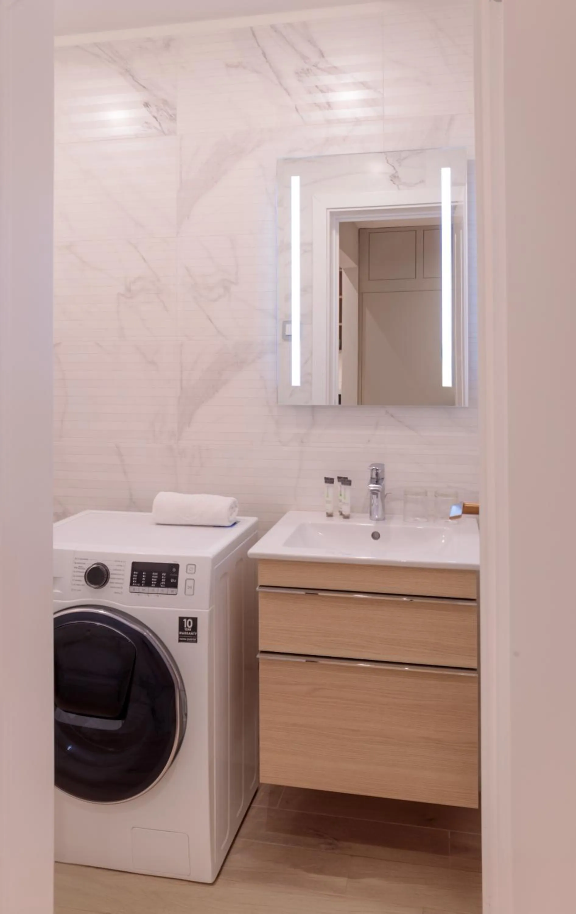 Bathroom in Emerald Downtown Luxury Suites by Continental Group