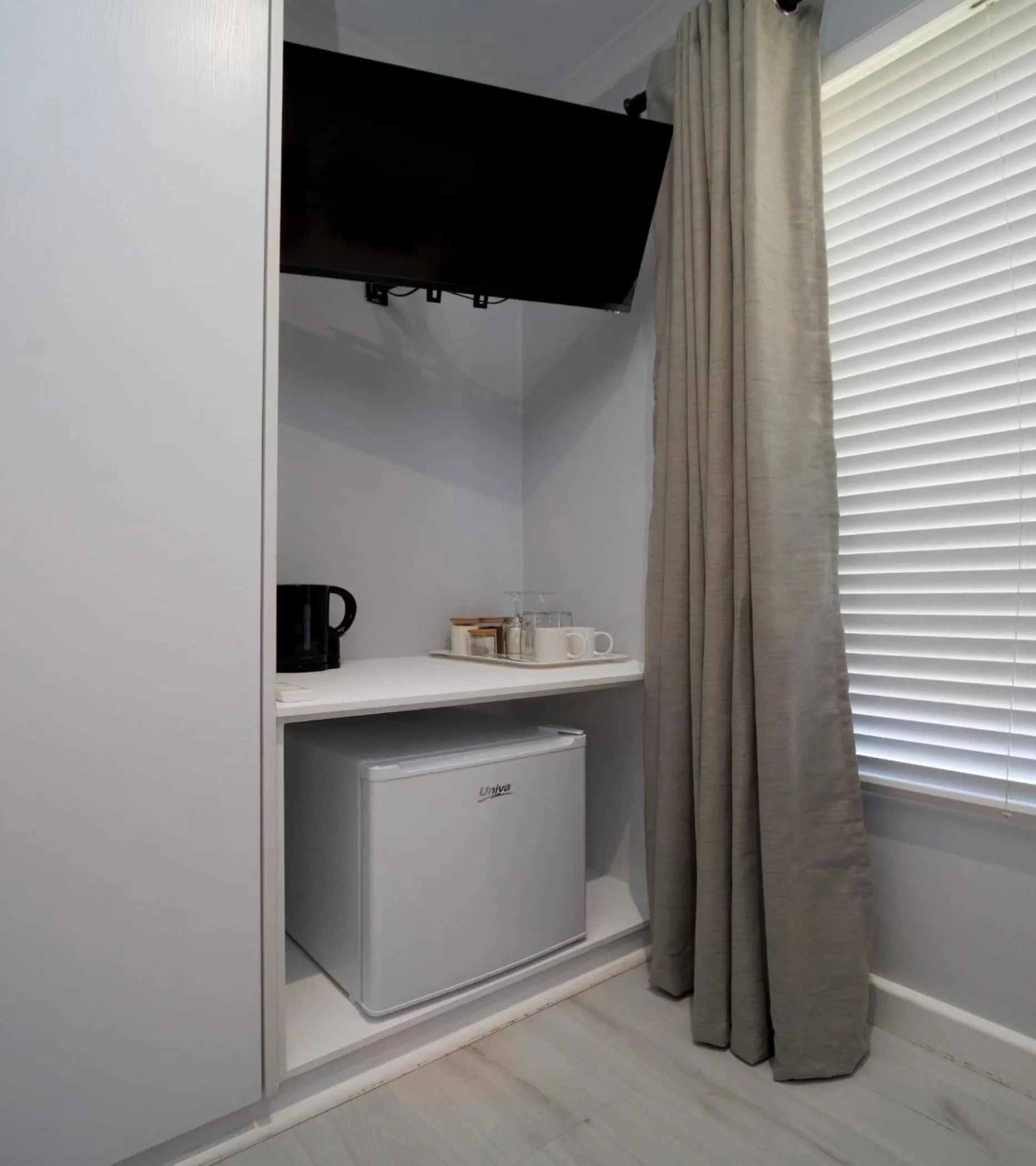 Photo of the whole room in Beachwood Inn Melkbosstrand