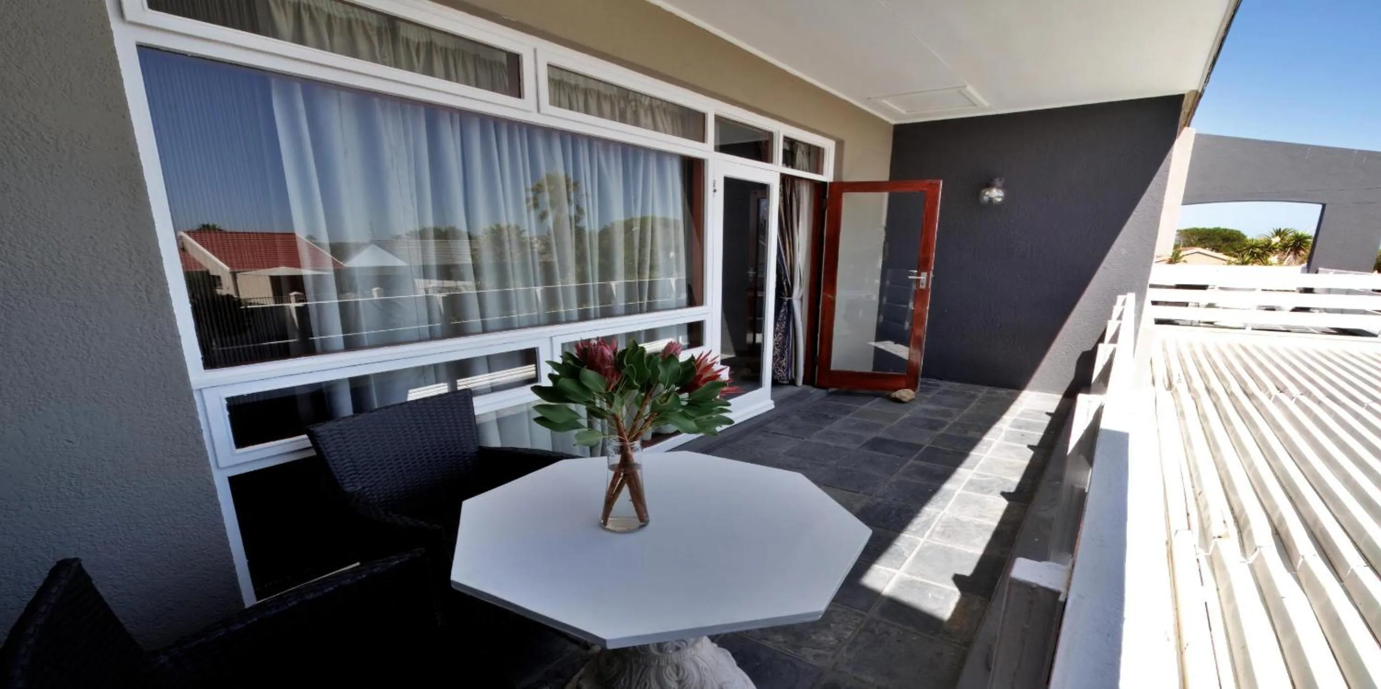 Seating area in Beachwood Inn Melkbosstrand