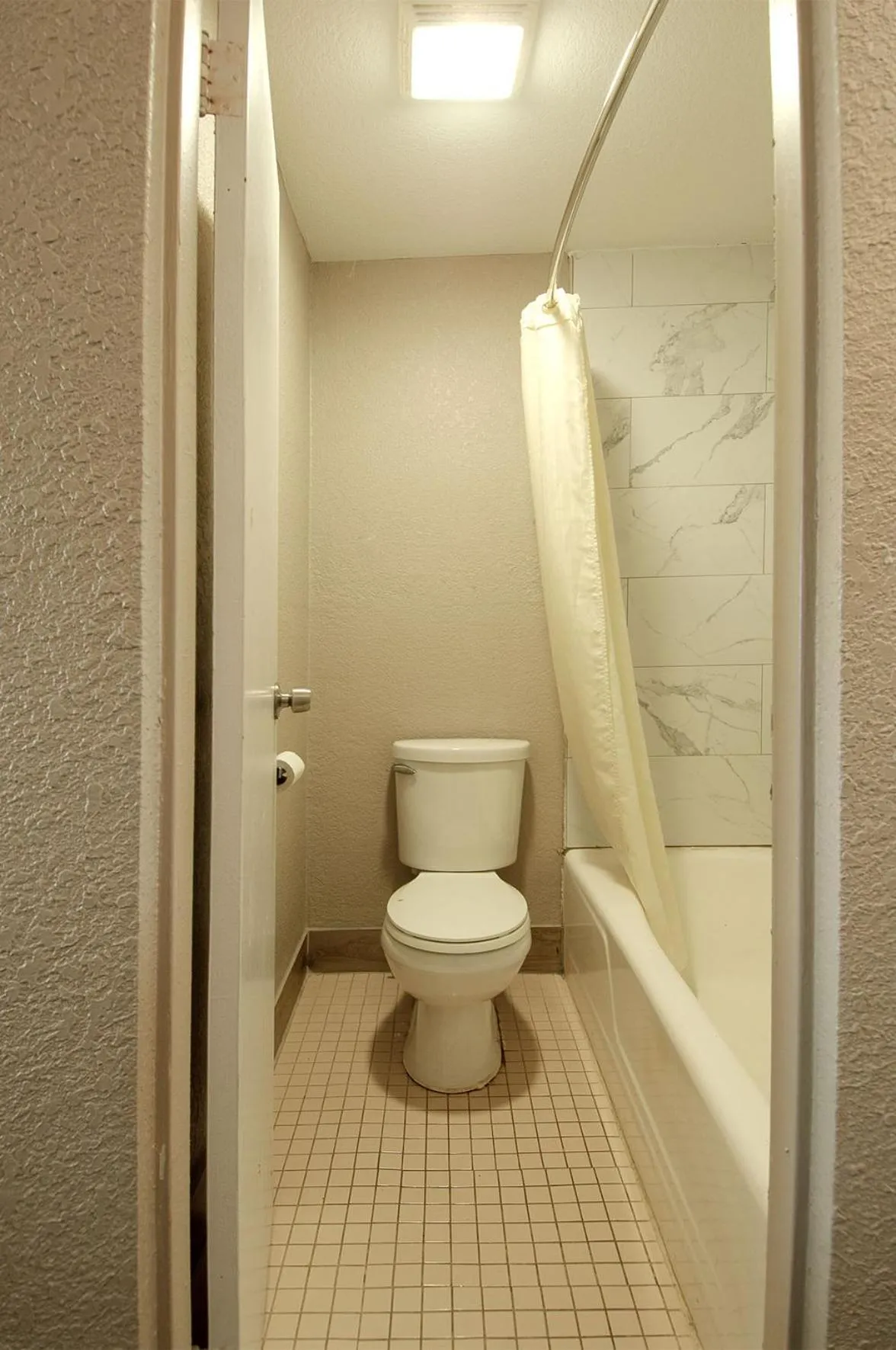 Bathroom in Town and Country INN