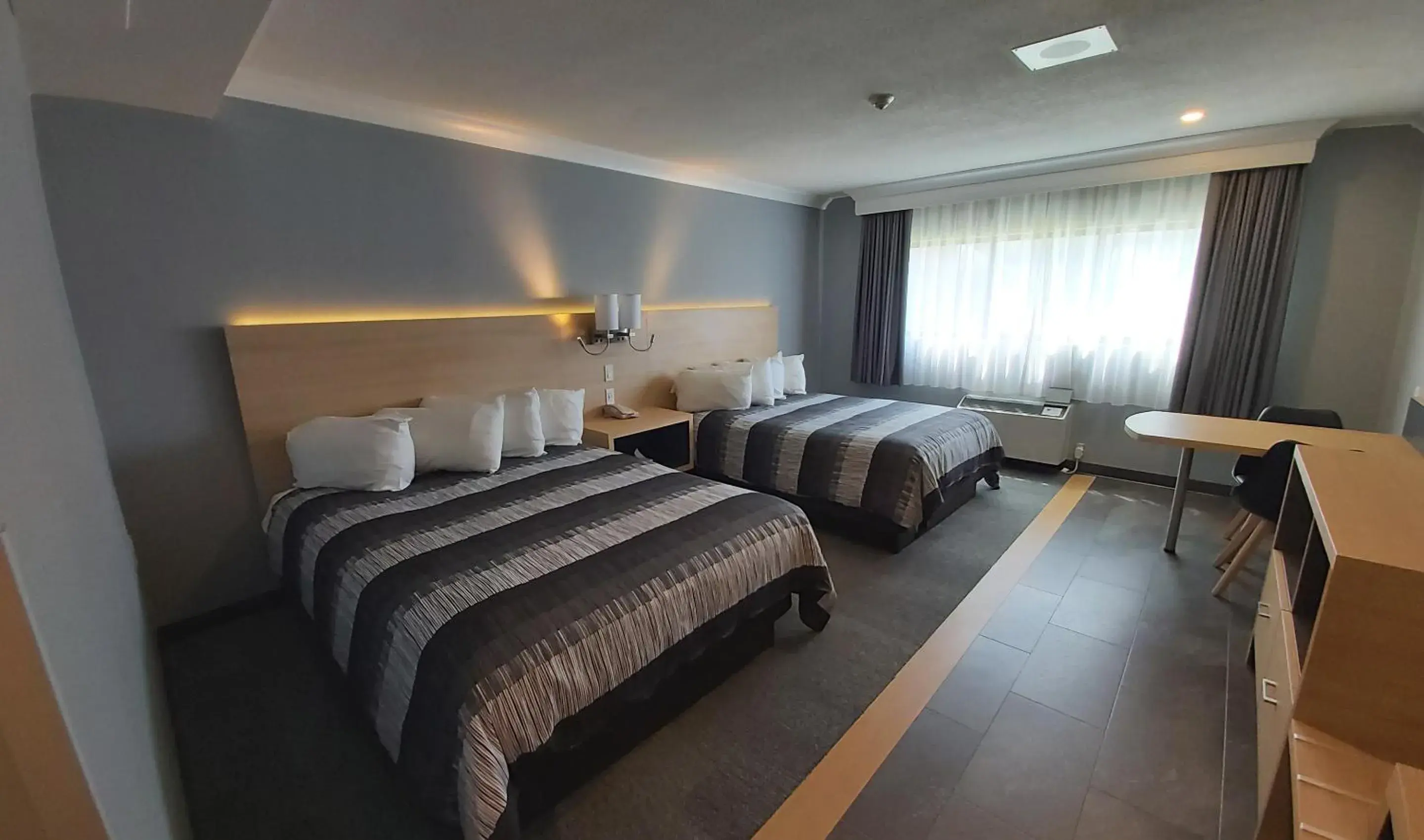 Deluxe 2 Queen Room - Waterpark in Americana Waterpark Resort & Spa Deluxe 2 Queen Room - Waterpark in Americana Waterpark Resort & Spa