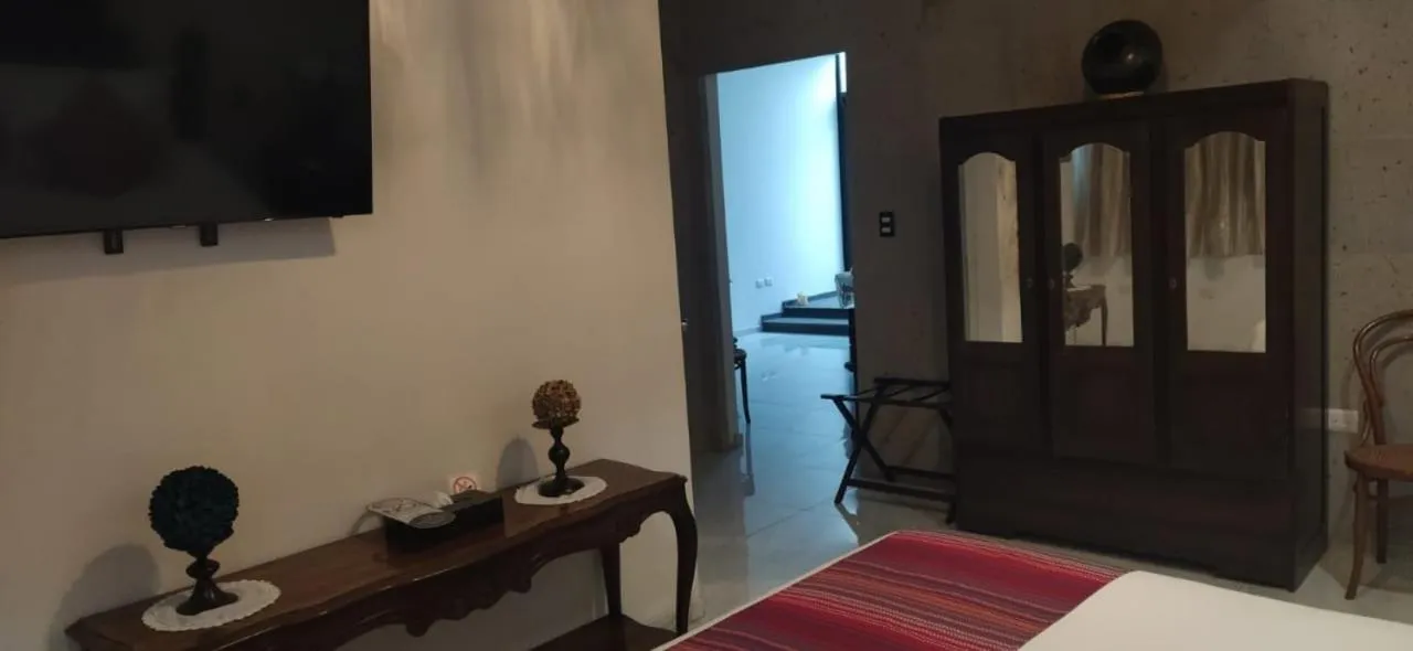 Bed in Posada de Maria Hotel Boutique & Spa