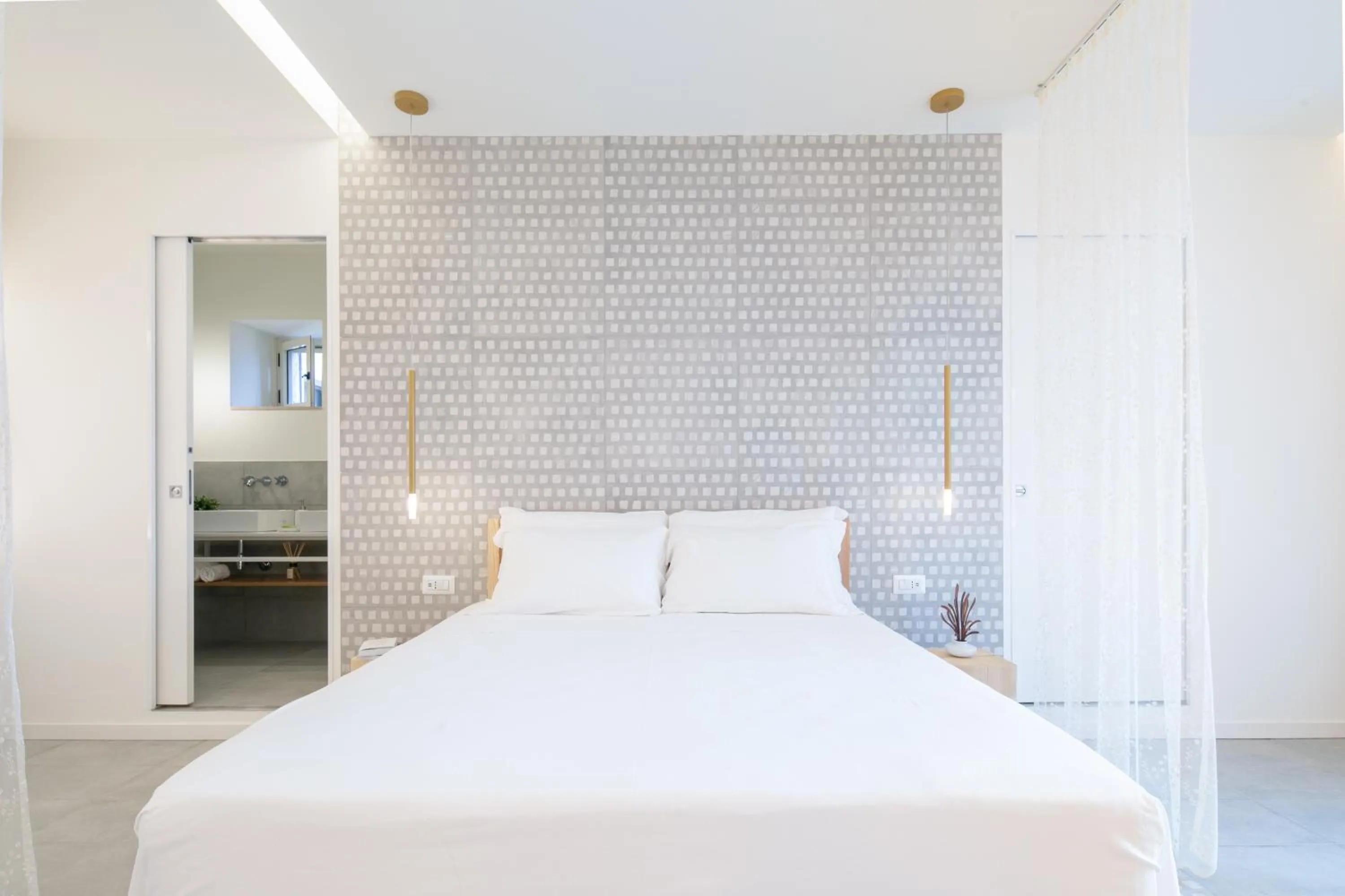 Bed in Terra del Sasso Suites - Design Architetto Salvatore Spataro