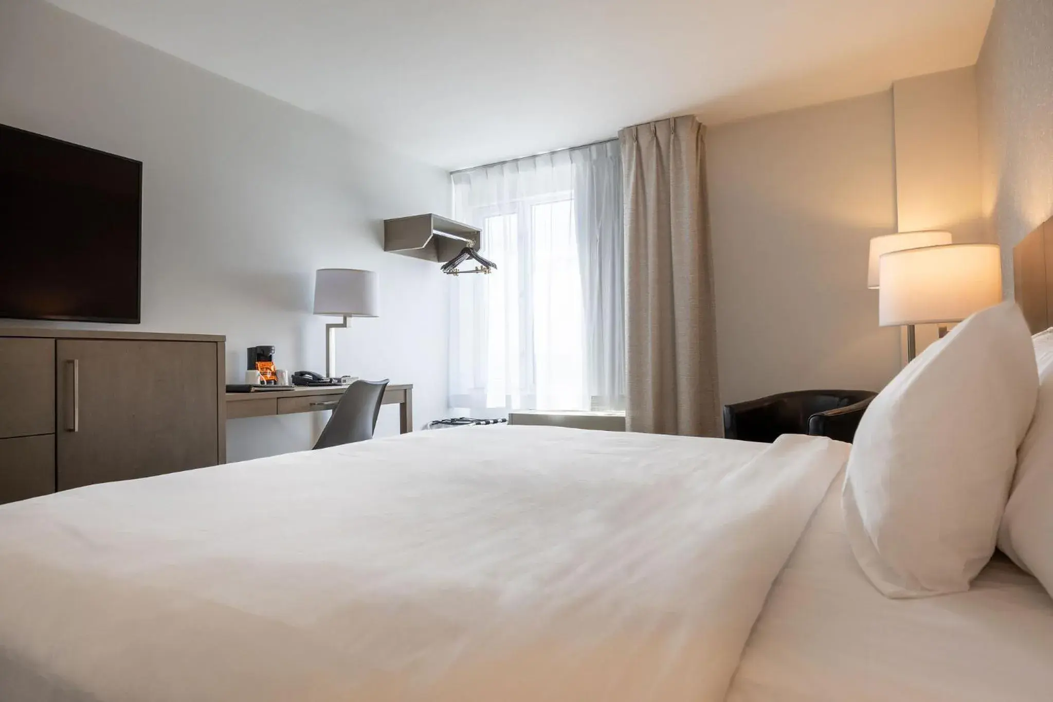 Bed in Repotel Henri IV Québec Bed in Repotel Henri IV Québec