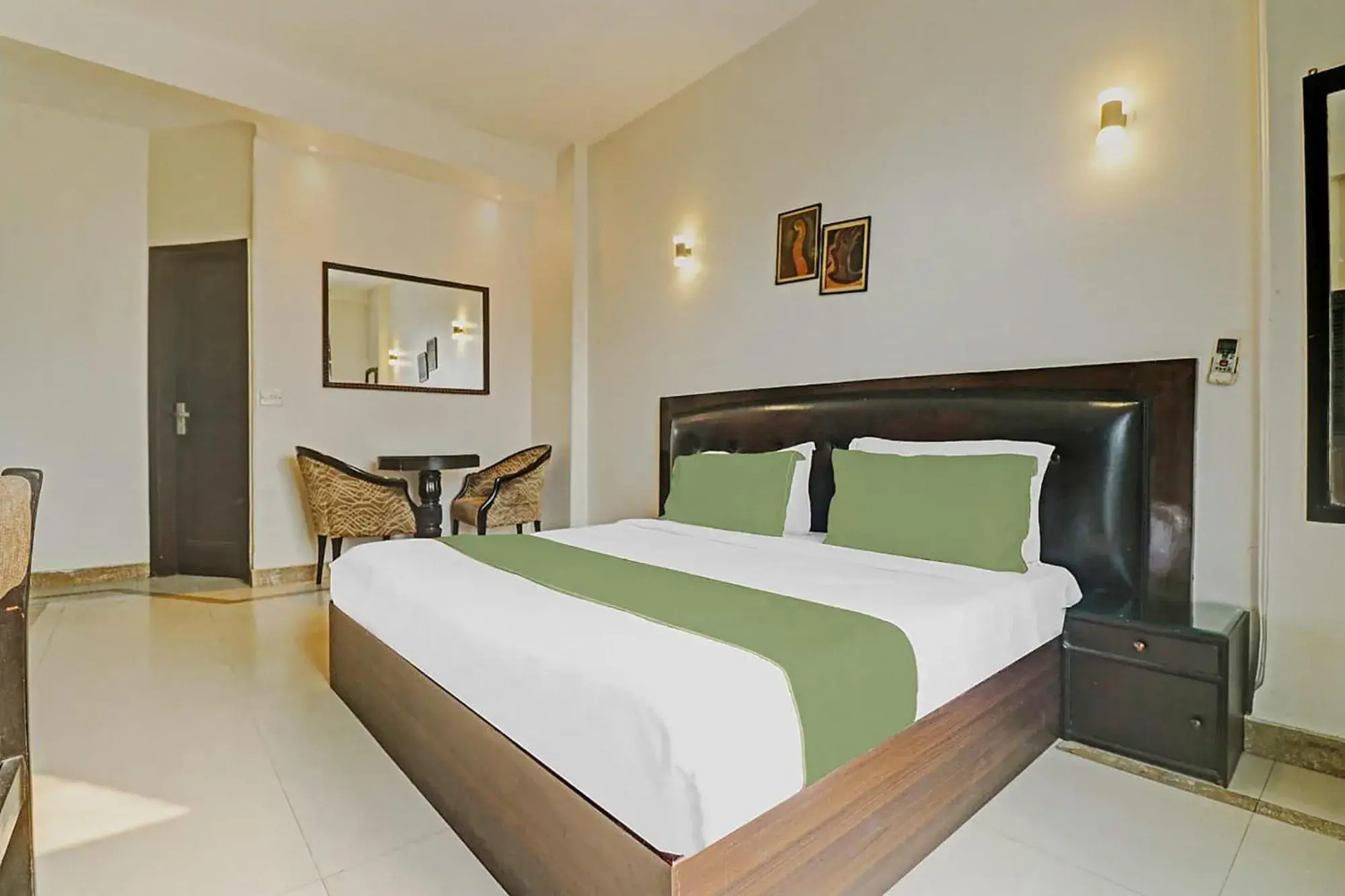 Deluxe Room - single occupancy in FabExpress Lloyd House Deluxe Room - single occupancy in FabExpress Lloyd House