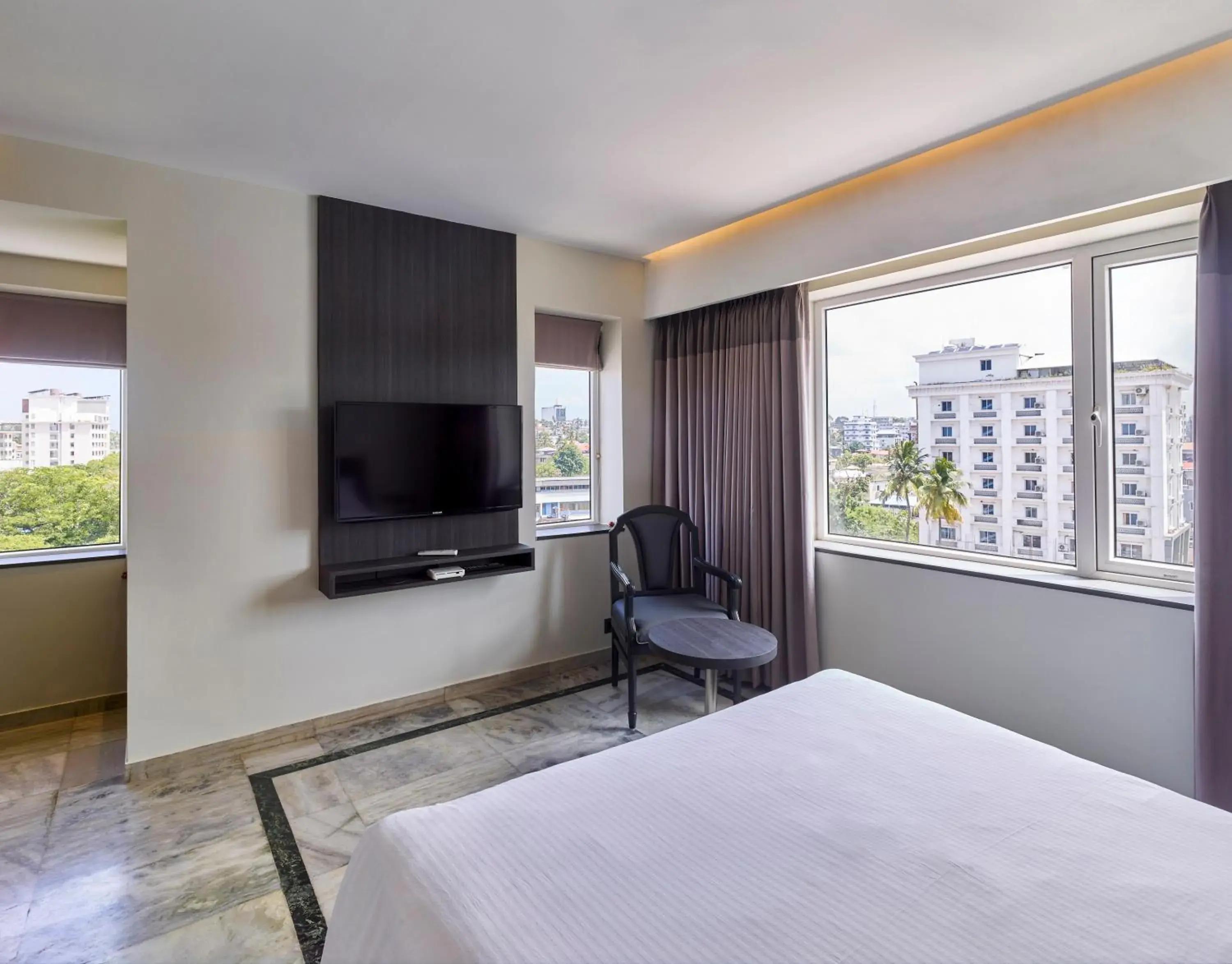 Bed in Ariya Nivaas A Vegetarian Hotel Bed in Ariya Nivaas A Vegetarian Hotel