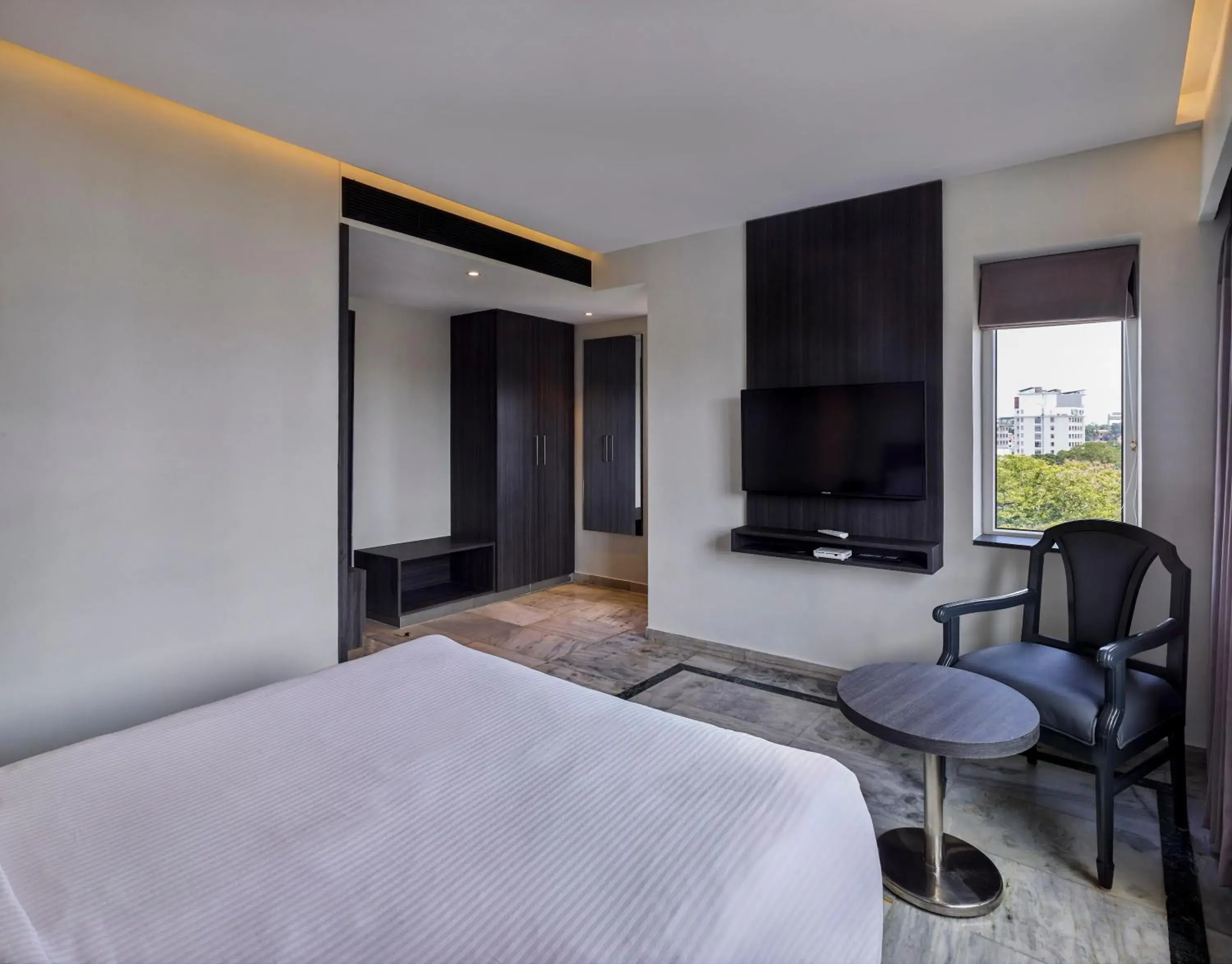 Bed in Ariya Nivaas A Vegetarian Hotel Bed in Ariya Nivaas A Vegetarian Hotel