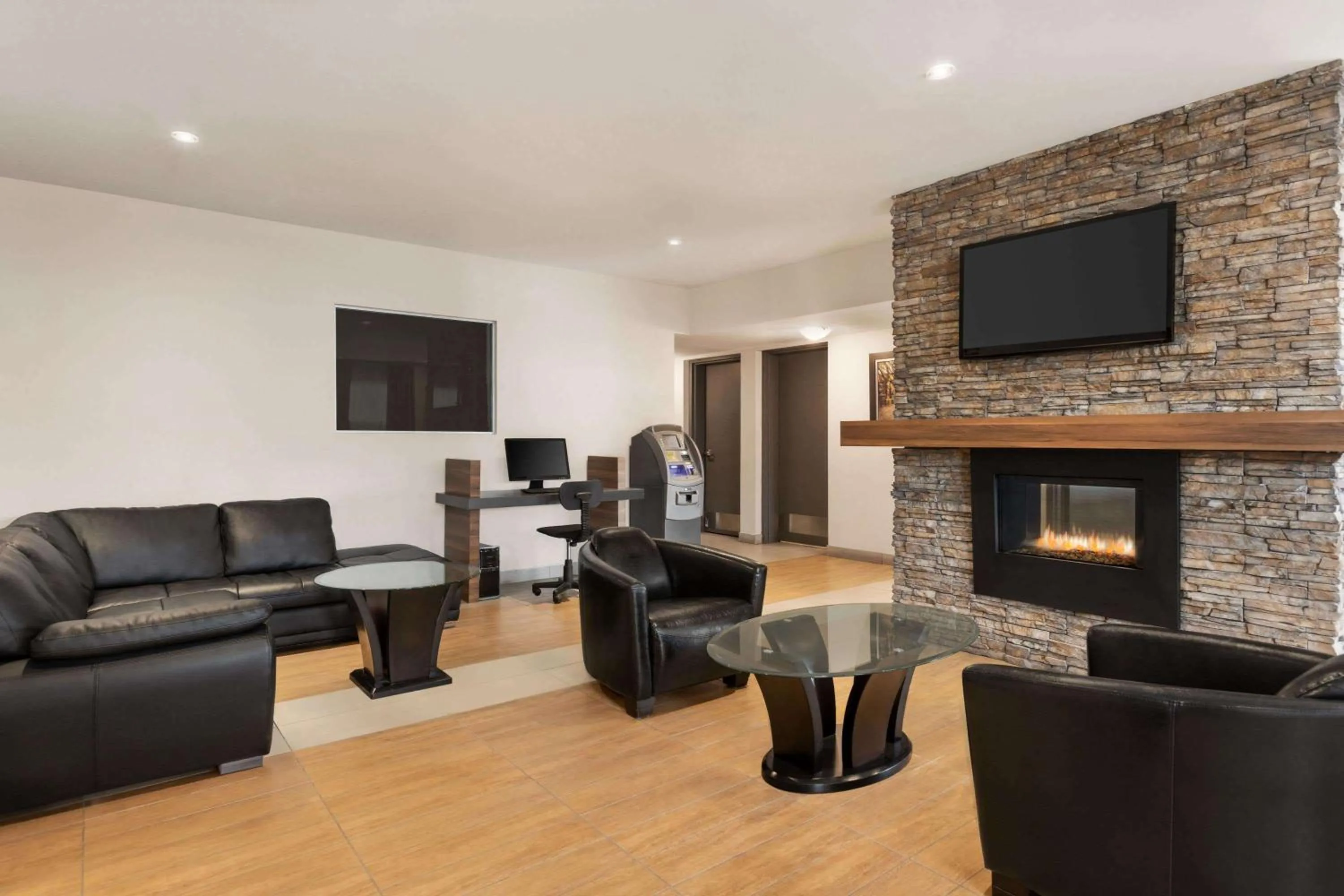 Lobby or reception in Days Inn by Wyndham Montreal East