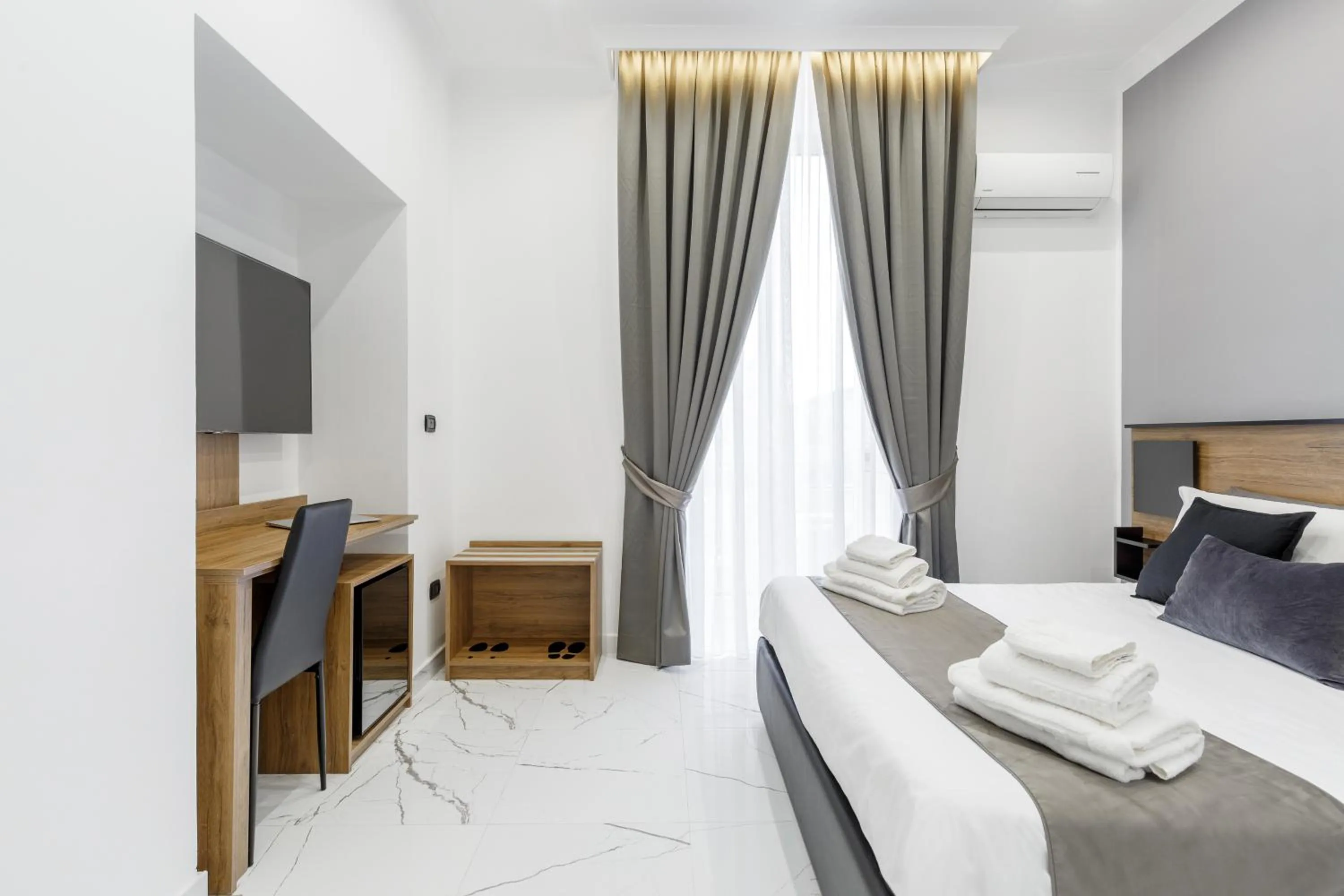 Bed in Sant'Angelo Suites