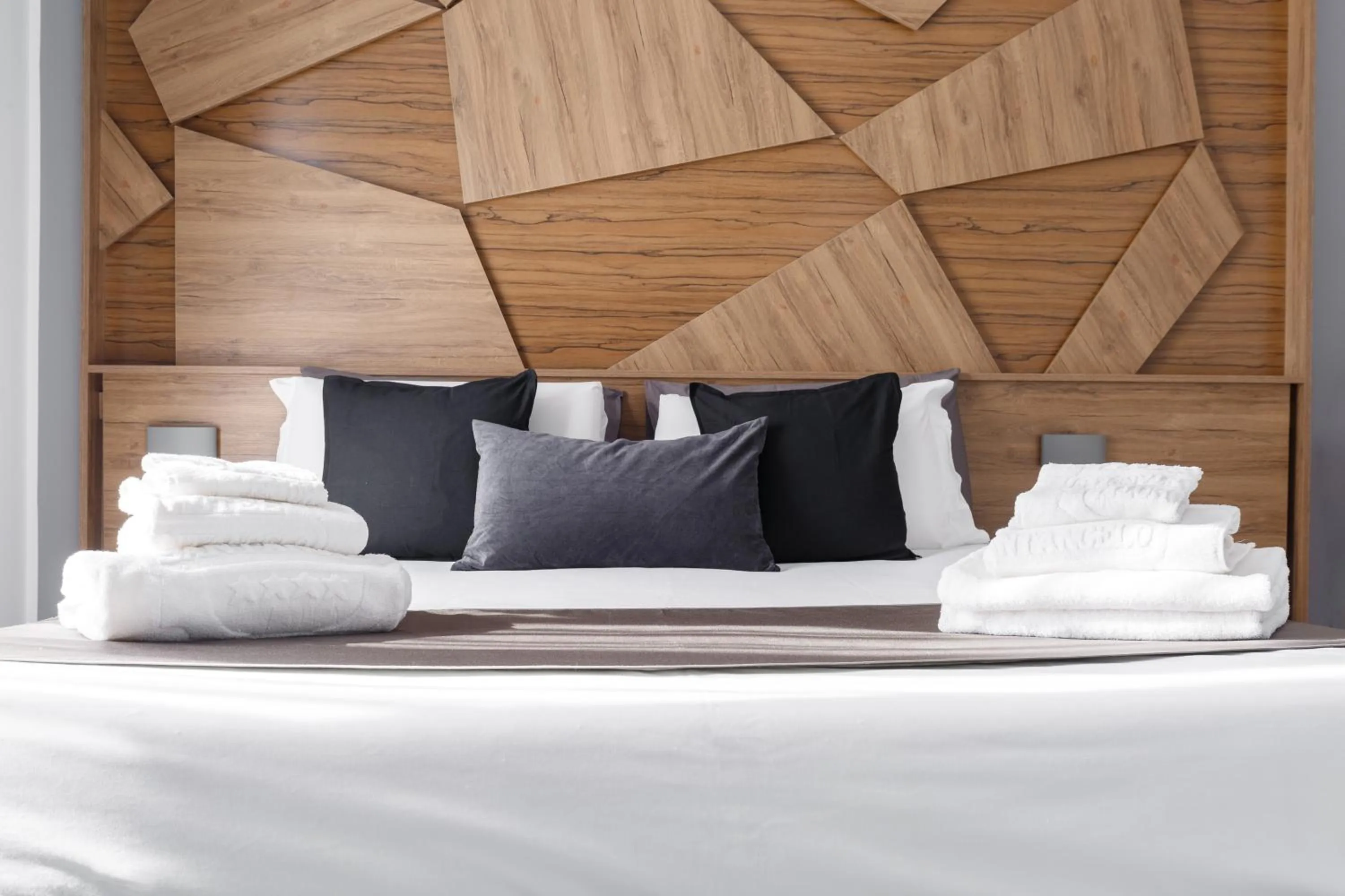 Bed in Sant'Angelo Suites