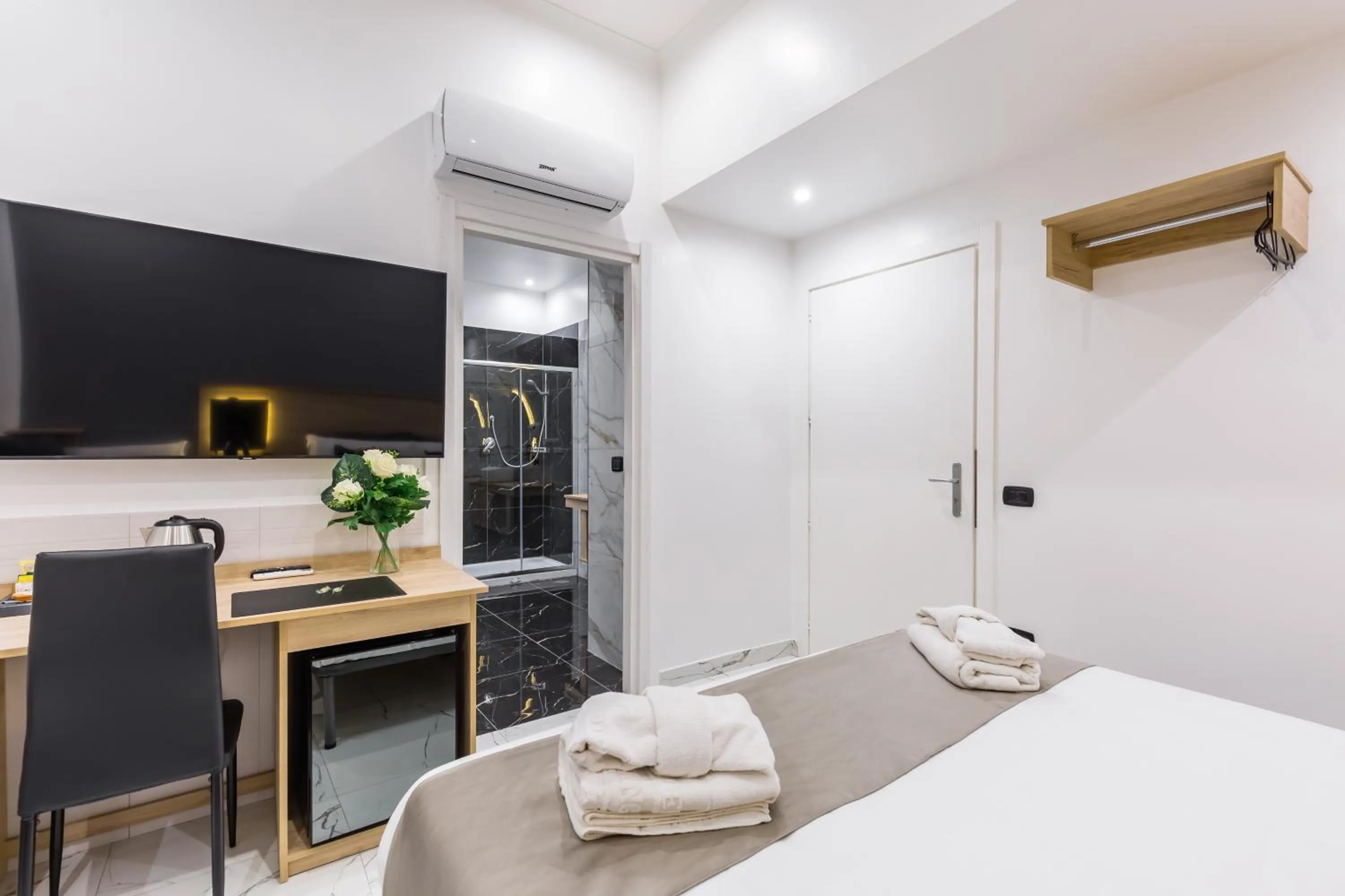 Bed in Sant'Angelo Suites