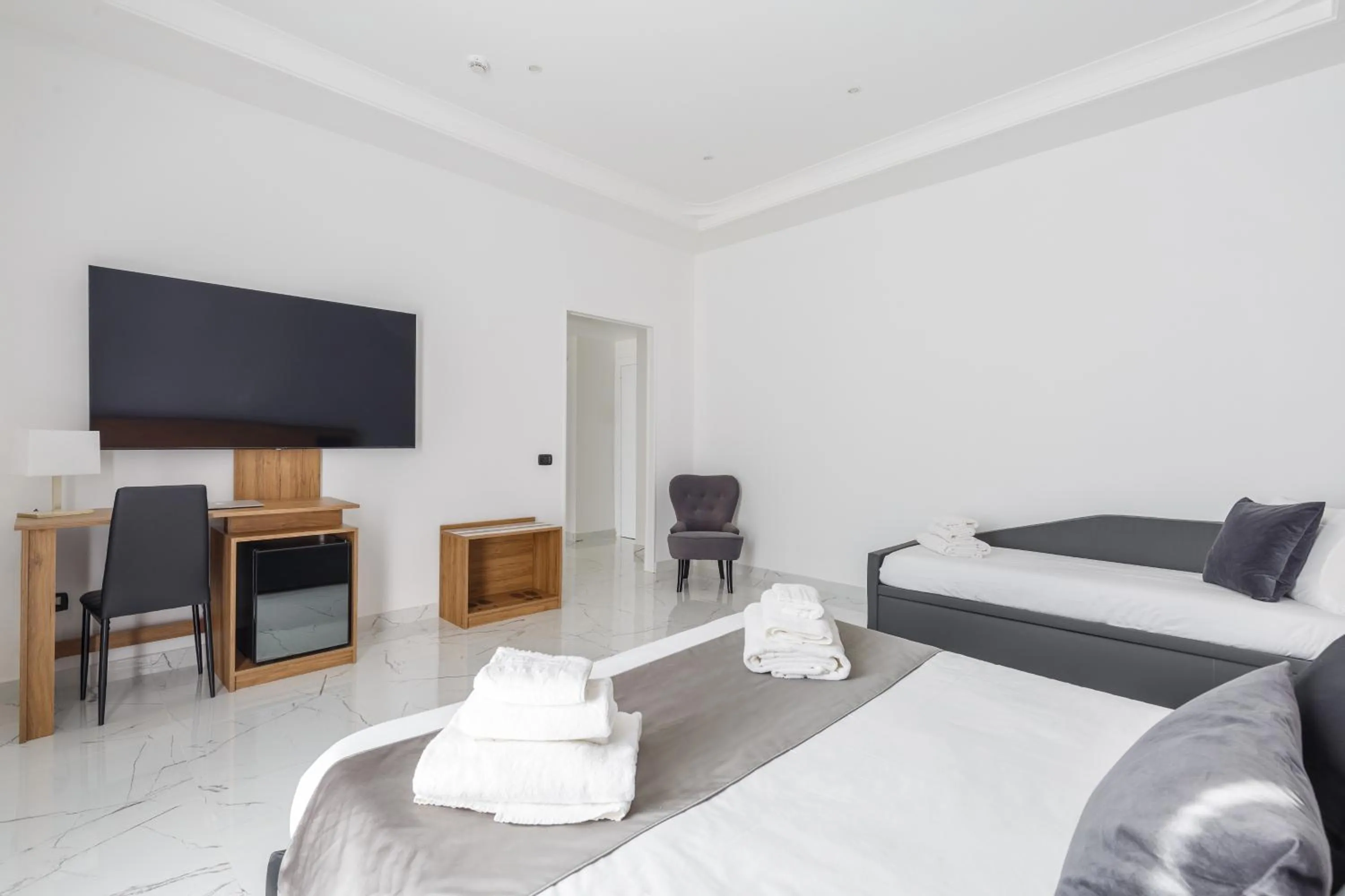 Bed in Sant'Angelo Suites