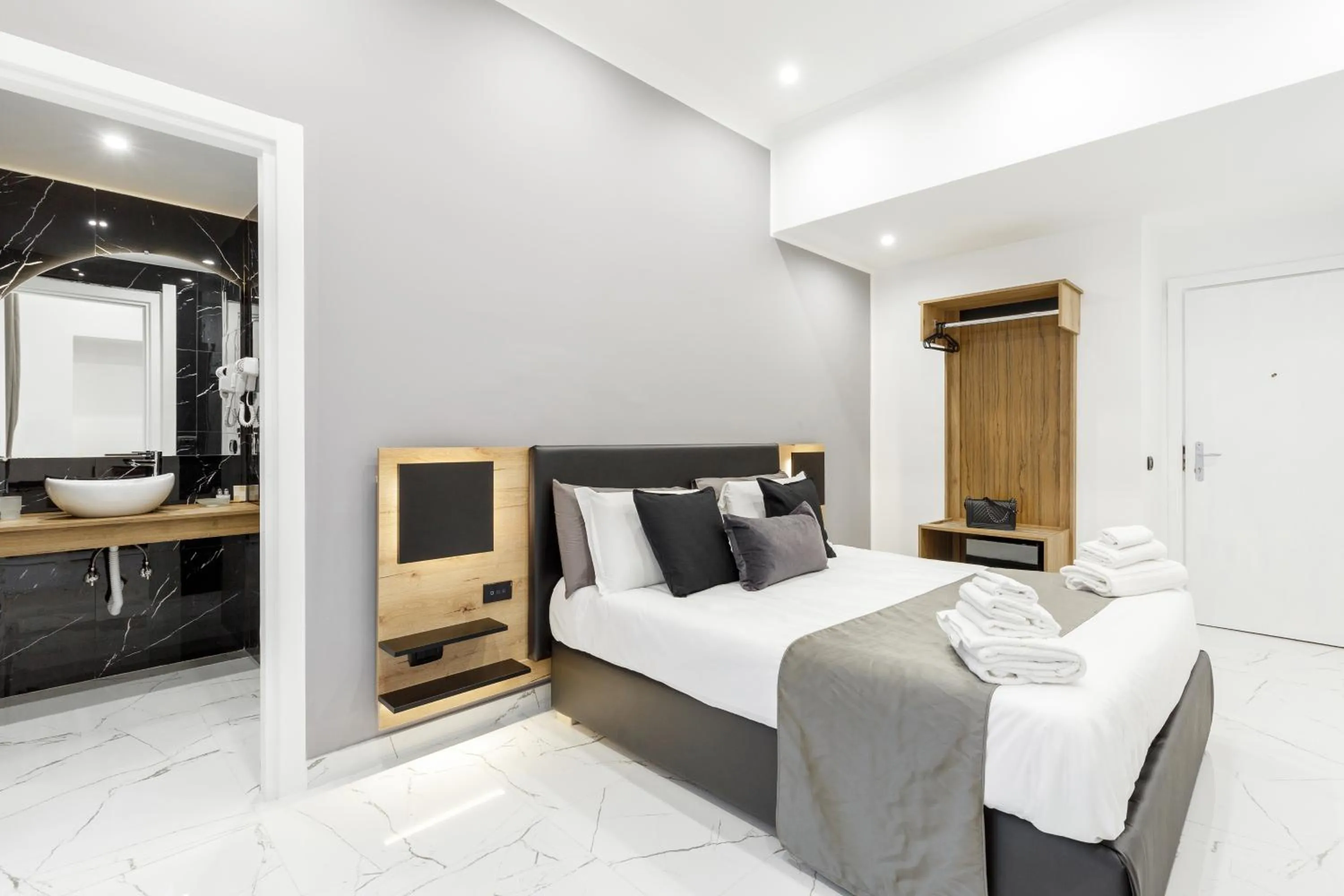 Bed in Sant'Angelo Suites