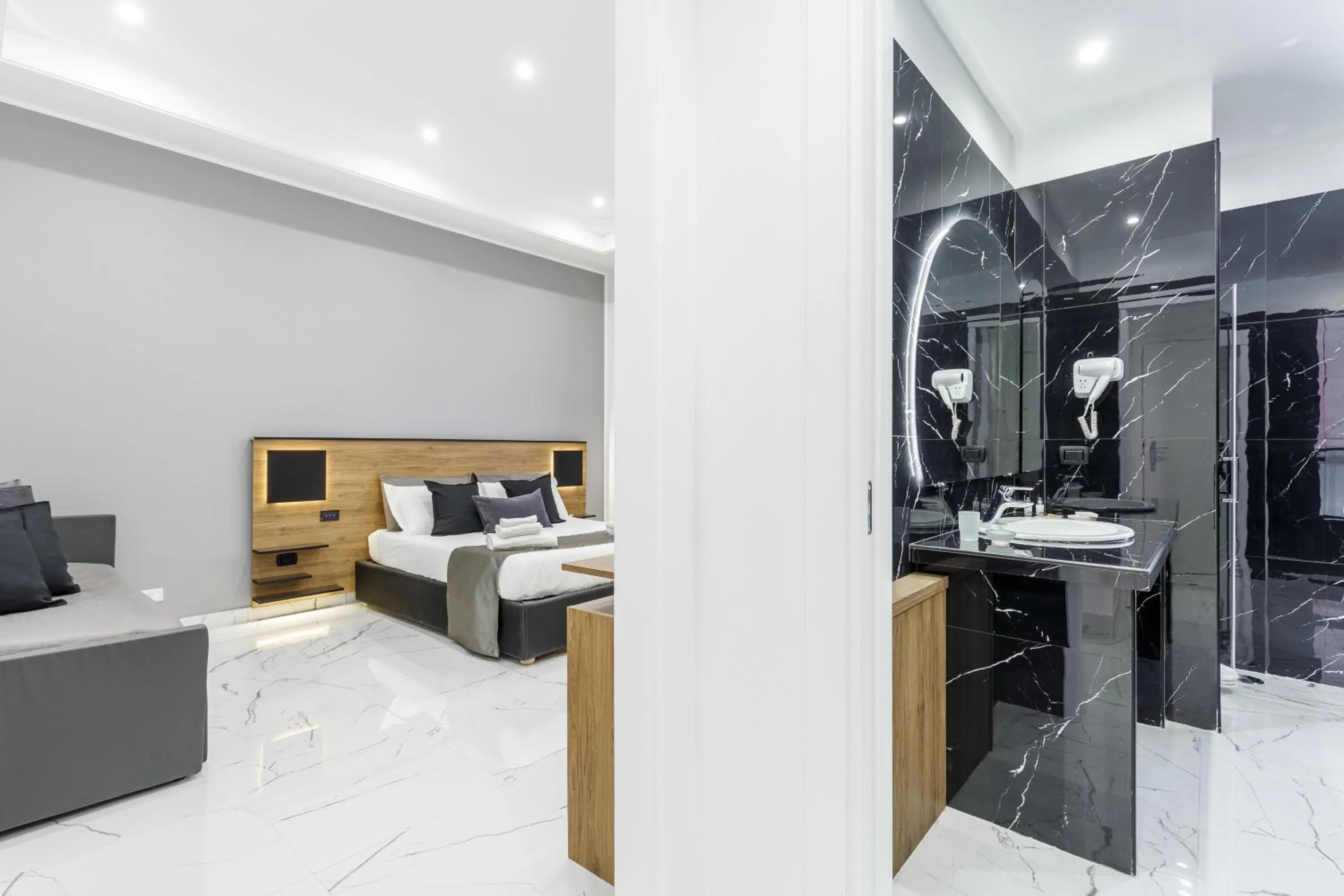 Bed in Sant'Angelo Suites