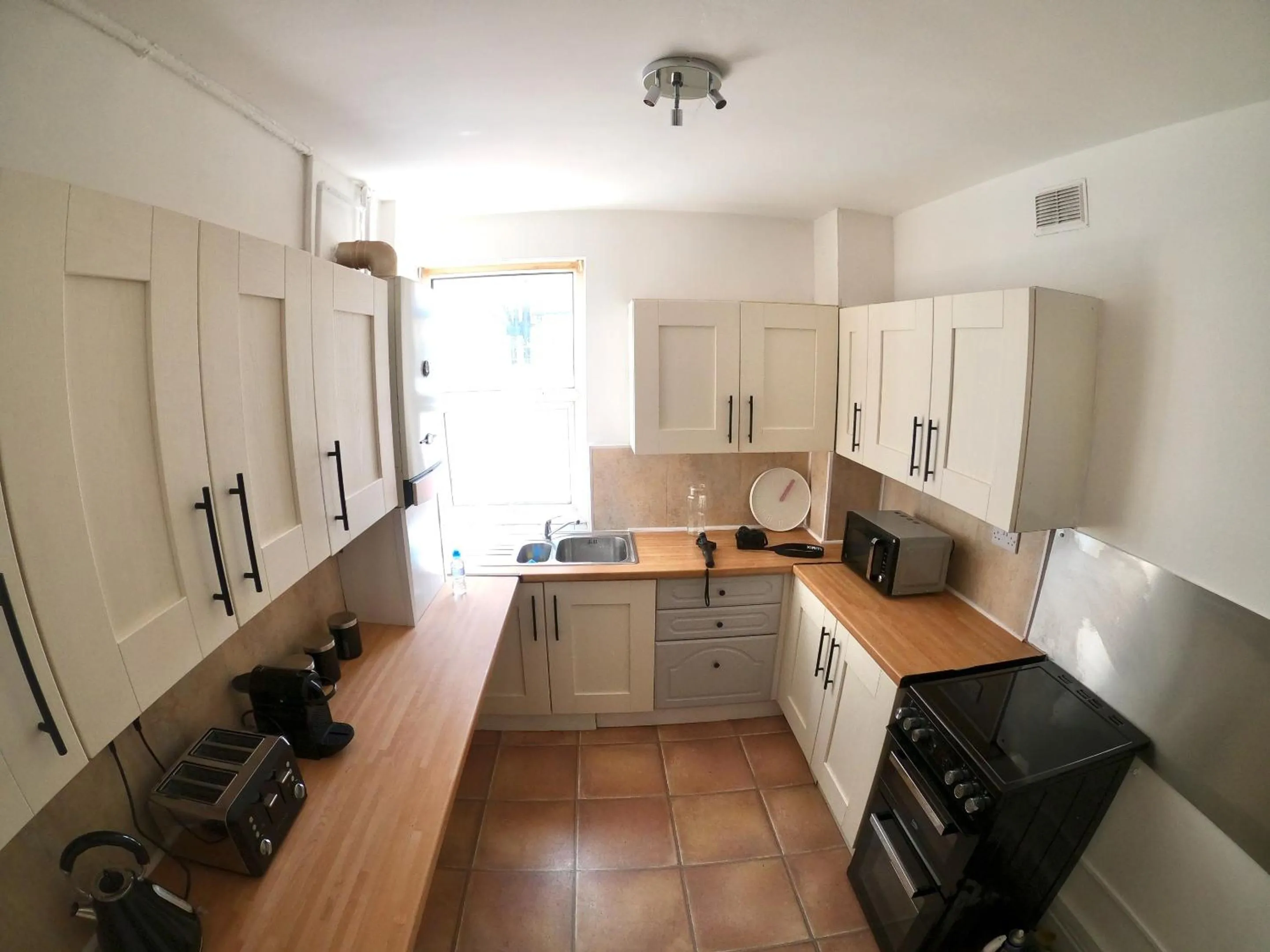 Kitchen or kitchenette in Blackpool Abode - Seaside Cove