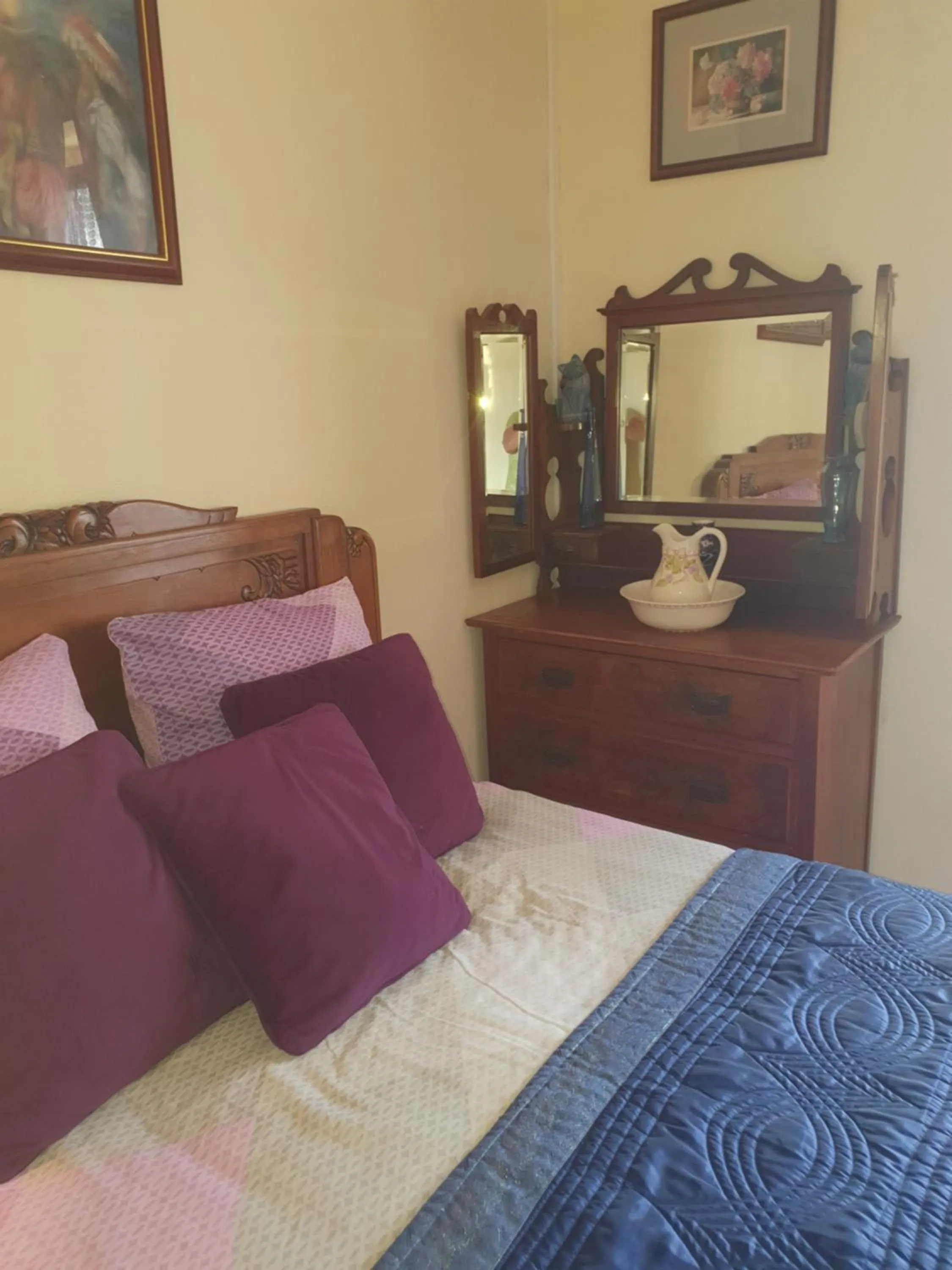 Bed in Sunset House Chambres de Hotes