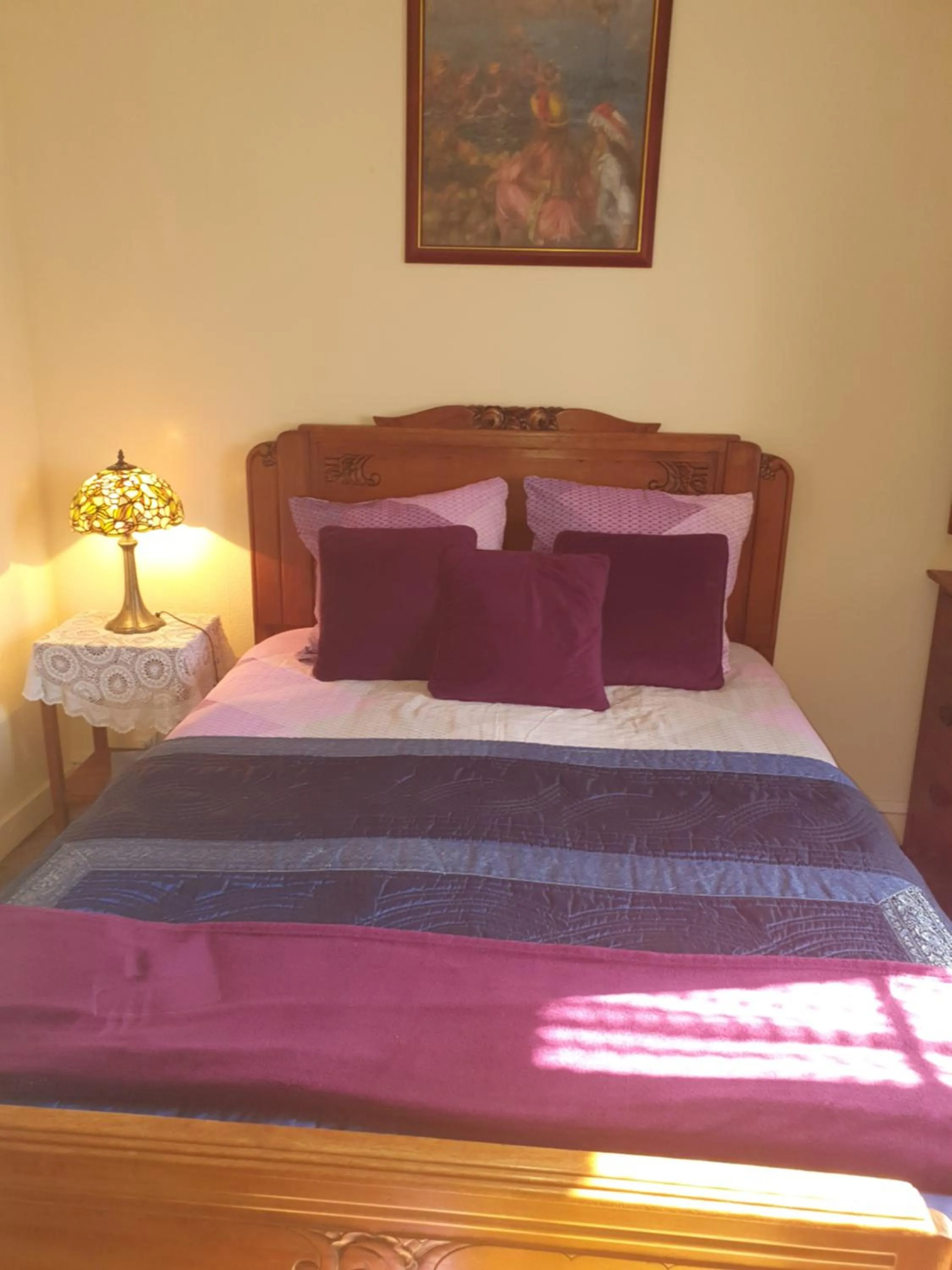 Bed in Sunset House Chambres de Hotes