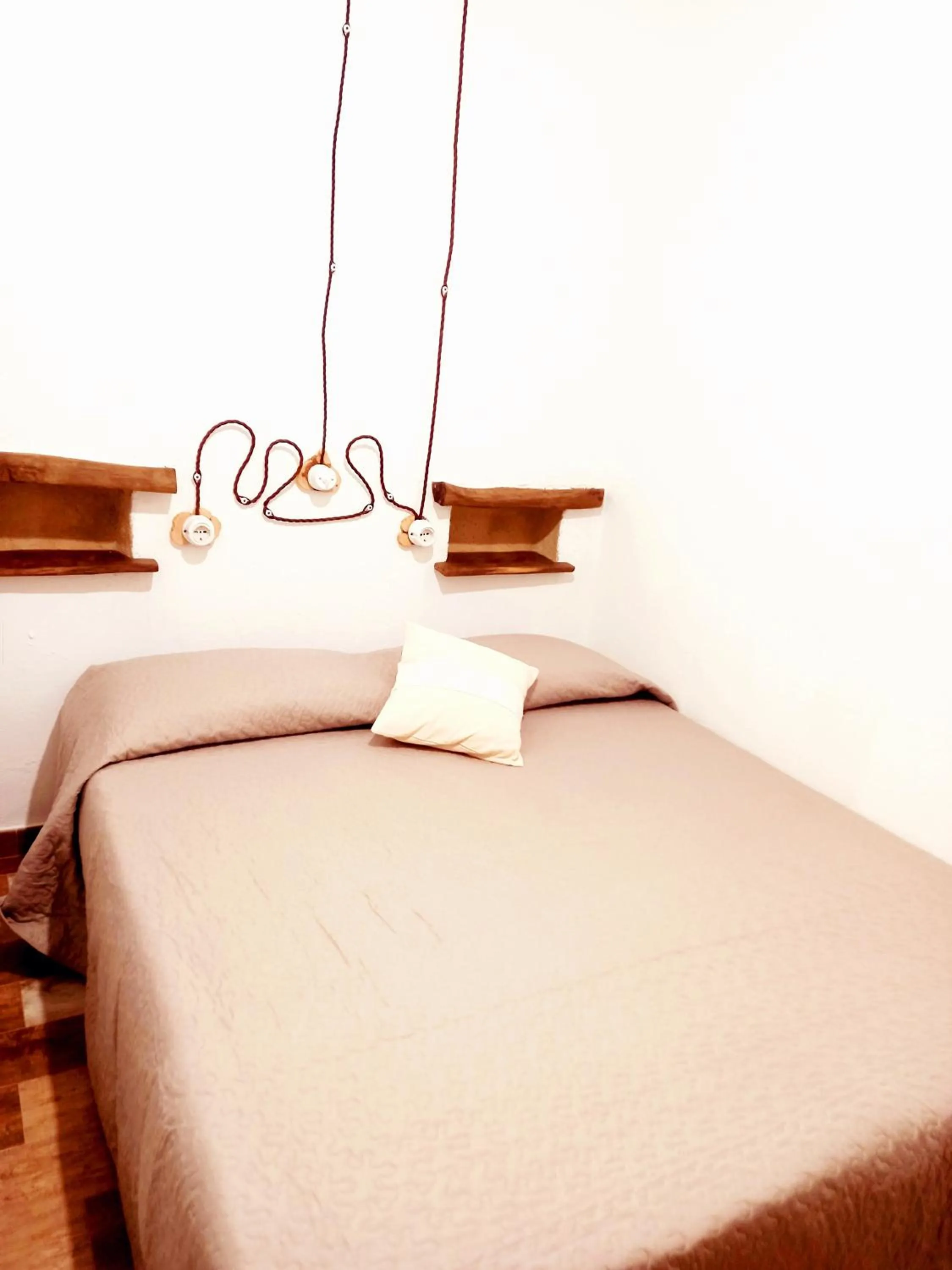 Bed in B&B Santu Giuvanni "Un tuffo nel passato Fonnese"