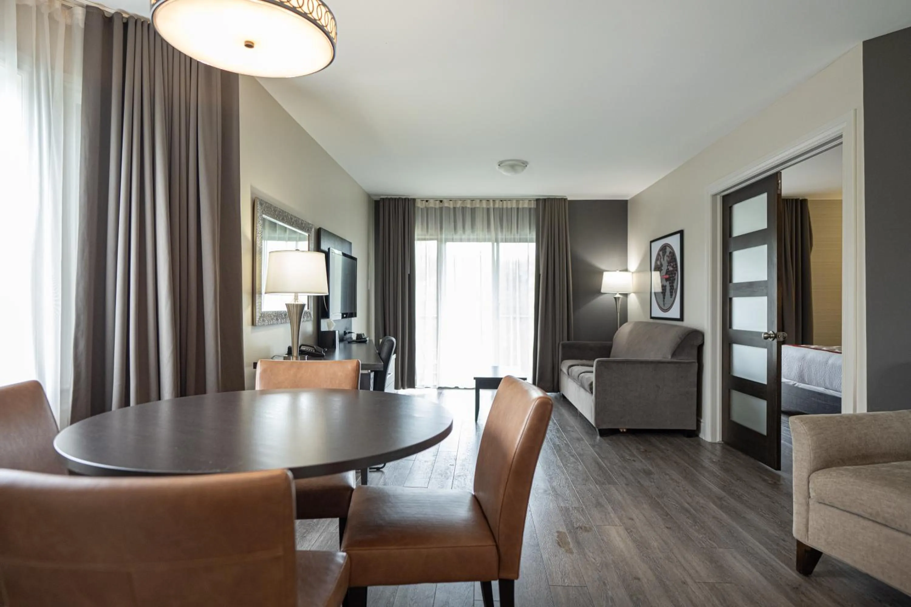 Living room in Ramada by Wyndham Ottawa On The Rideau