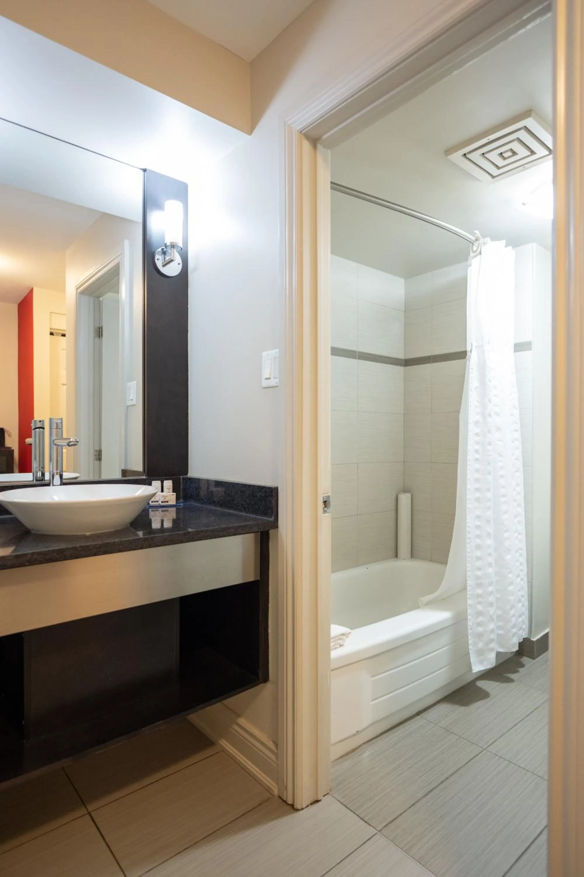 Bathroom in Ramada by Wyndham Ottawa On The Rideau