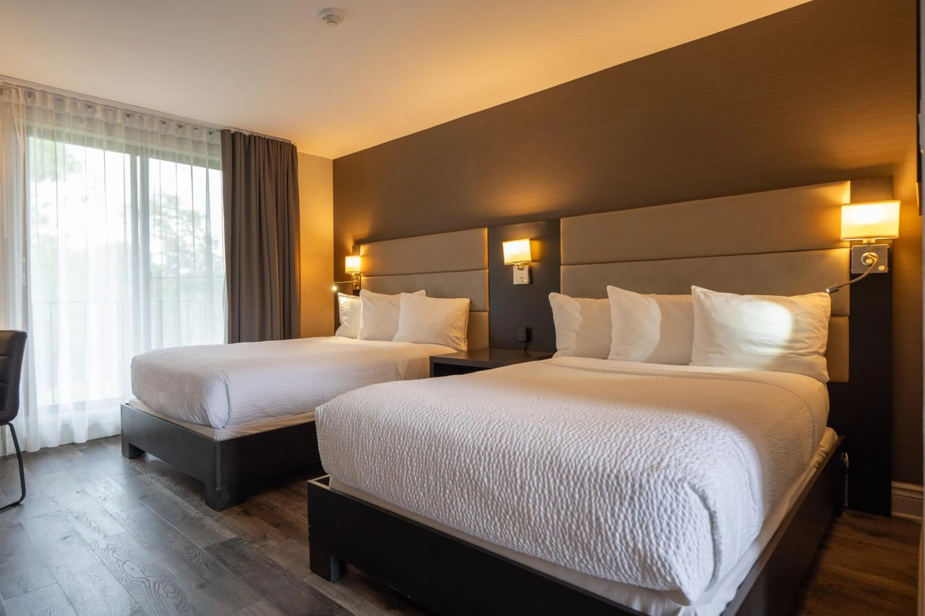 Bed in Ramada by Wyndham Ottawa On The Rideau