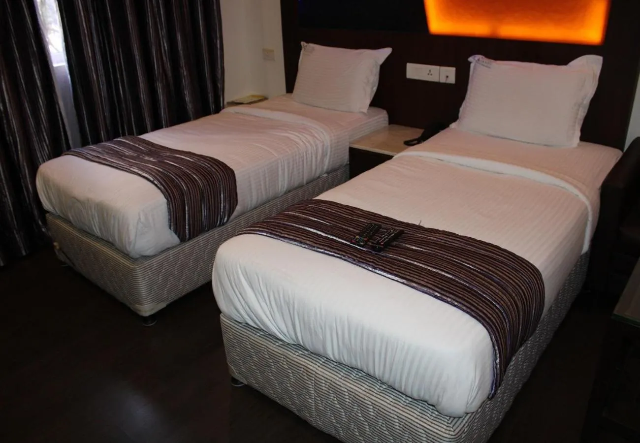 Bed in Hotel M Grand