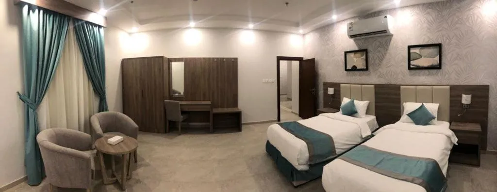 Living room, Bed in Al-Haramain Family Apartments