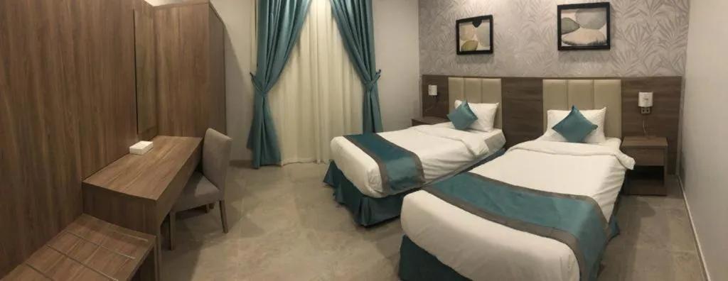 Bed in Al-Haramain Family Apartments