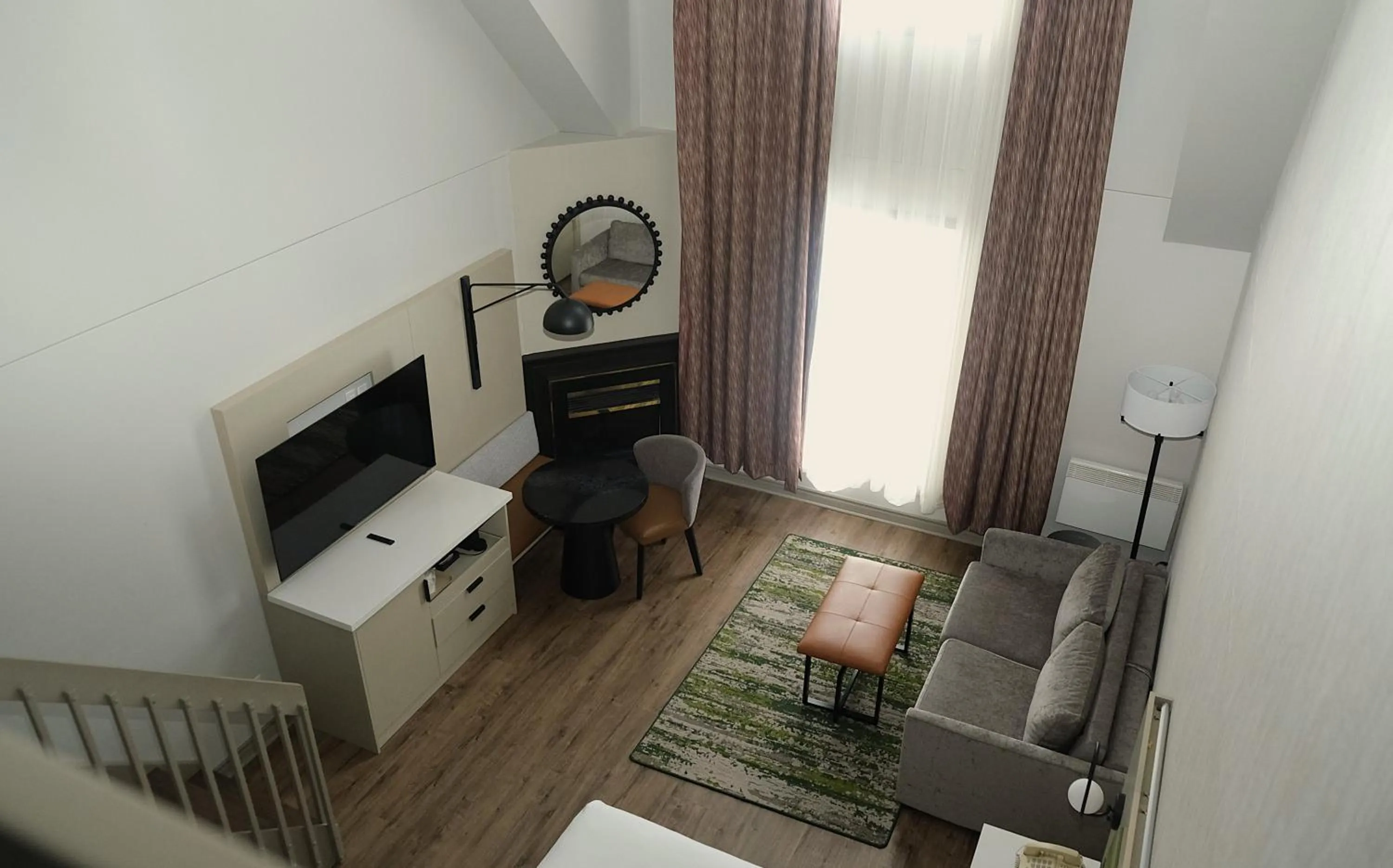 Communal lounge/ TV room in Ramada Plaza by Wyndham Gatineau/Manoir du Casino