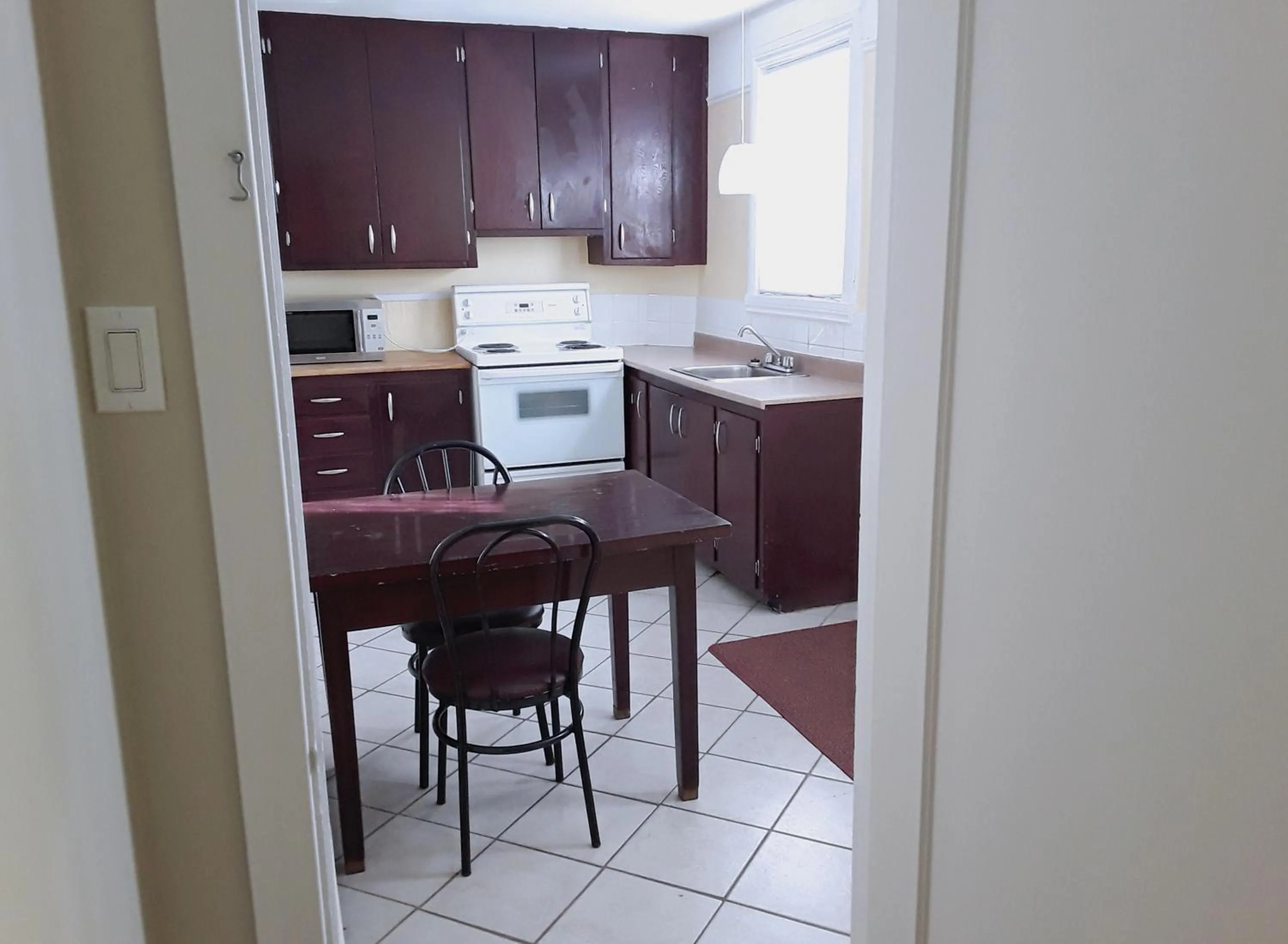 Kitchen or kitchenette in Hotel Auberge Michel Doyon
