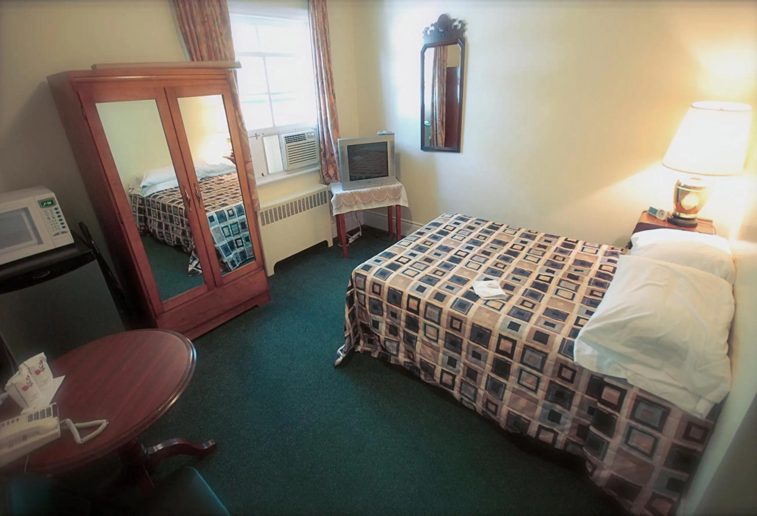 Bedroom in Hotel Auberge Michel Doyon