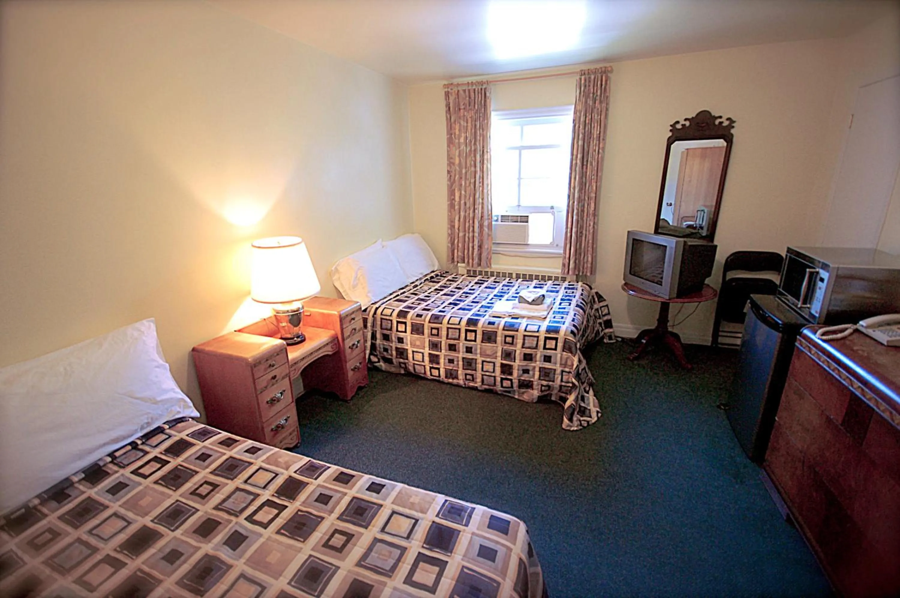 Bedroom in Hotel Auberge Michel Doyon