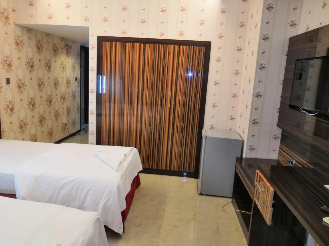 Bed in BURJ NAHAR HOTEL L.L.C