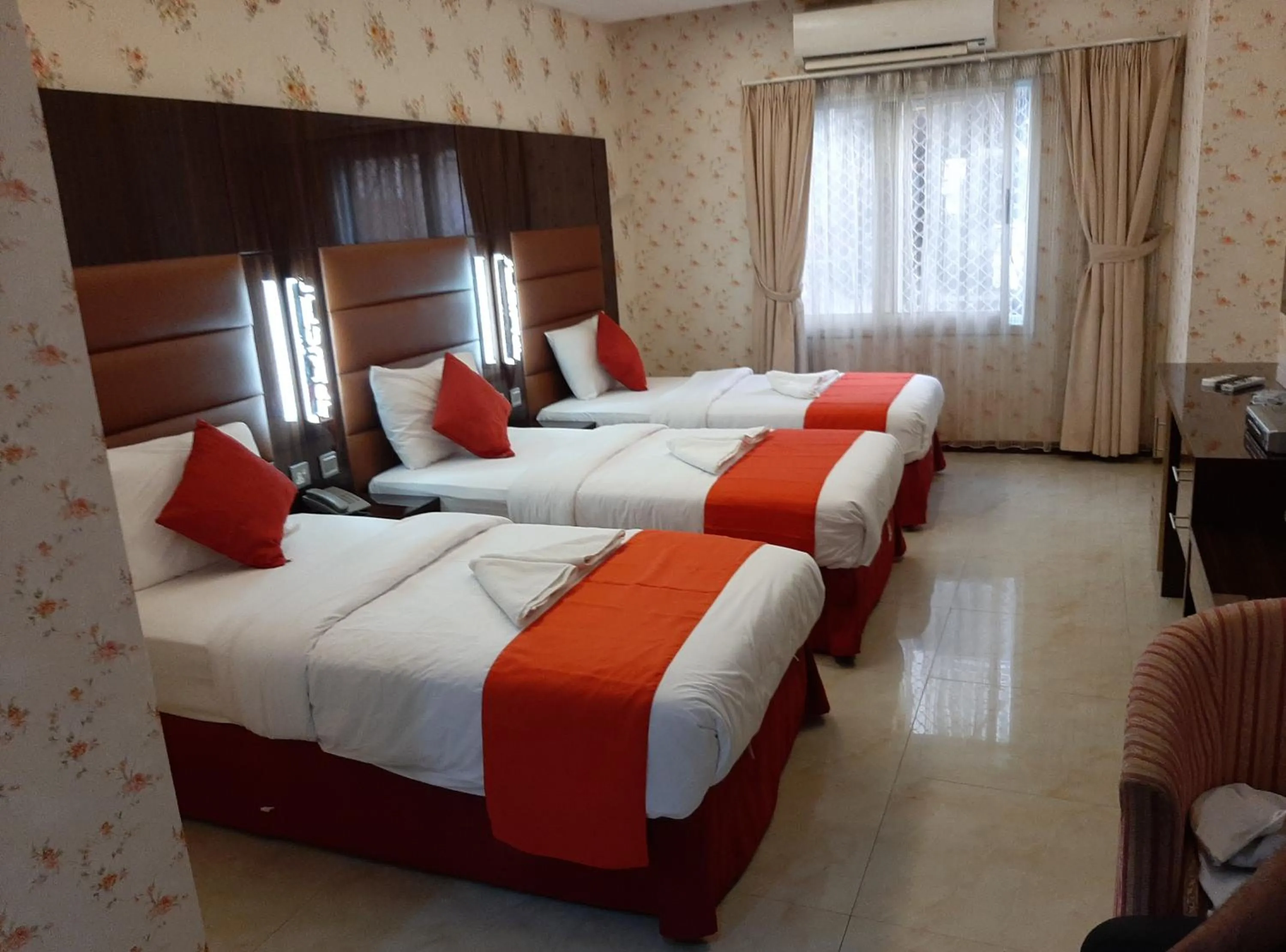 Bed in BURJ NAHAR HOTEL L.L.C