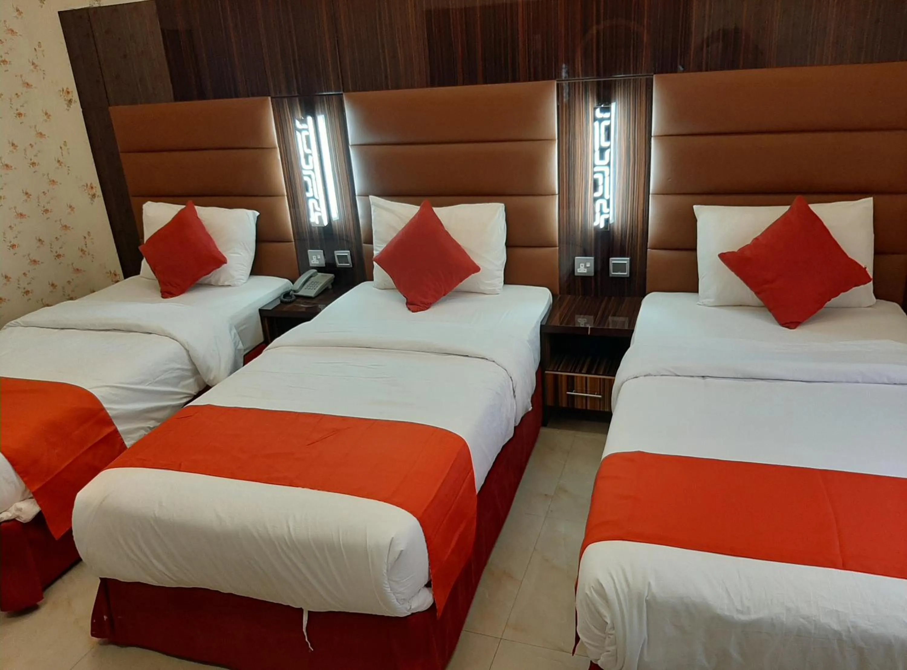 Bed in BURJ NAHAR HOTEL L.L.C