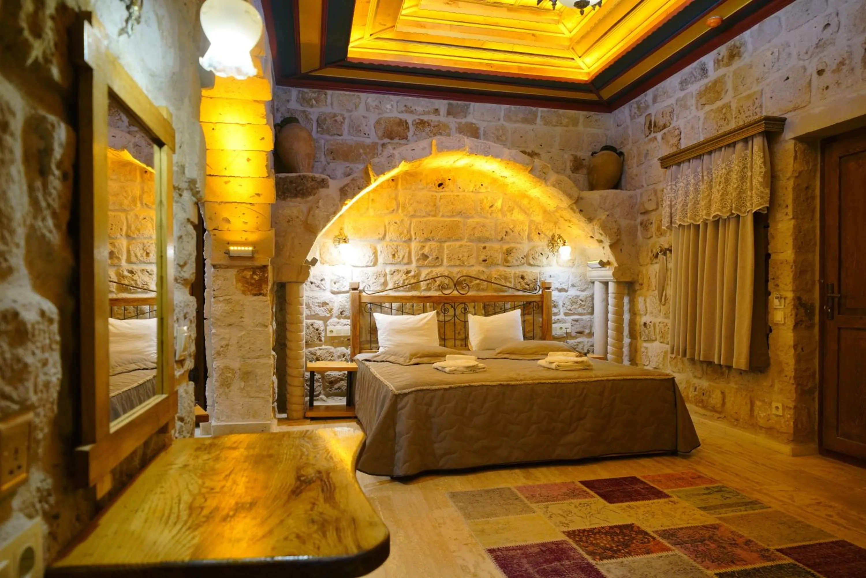 Bed in Göreme Cave Lodge