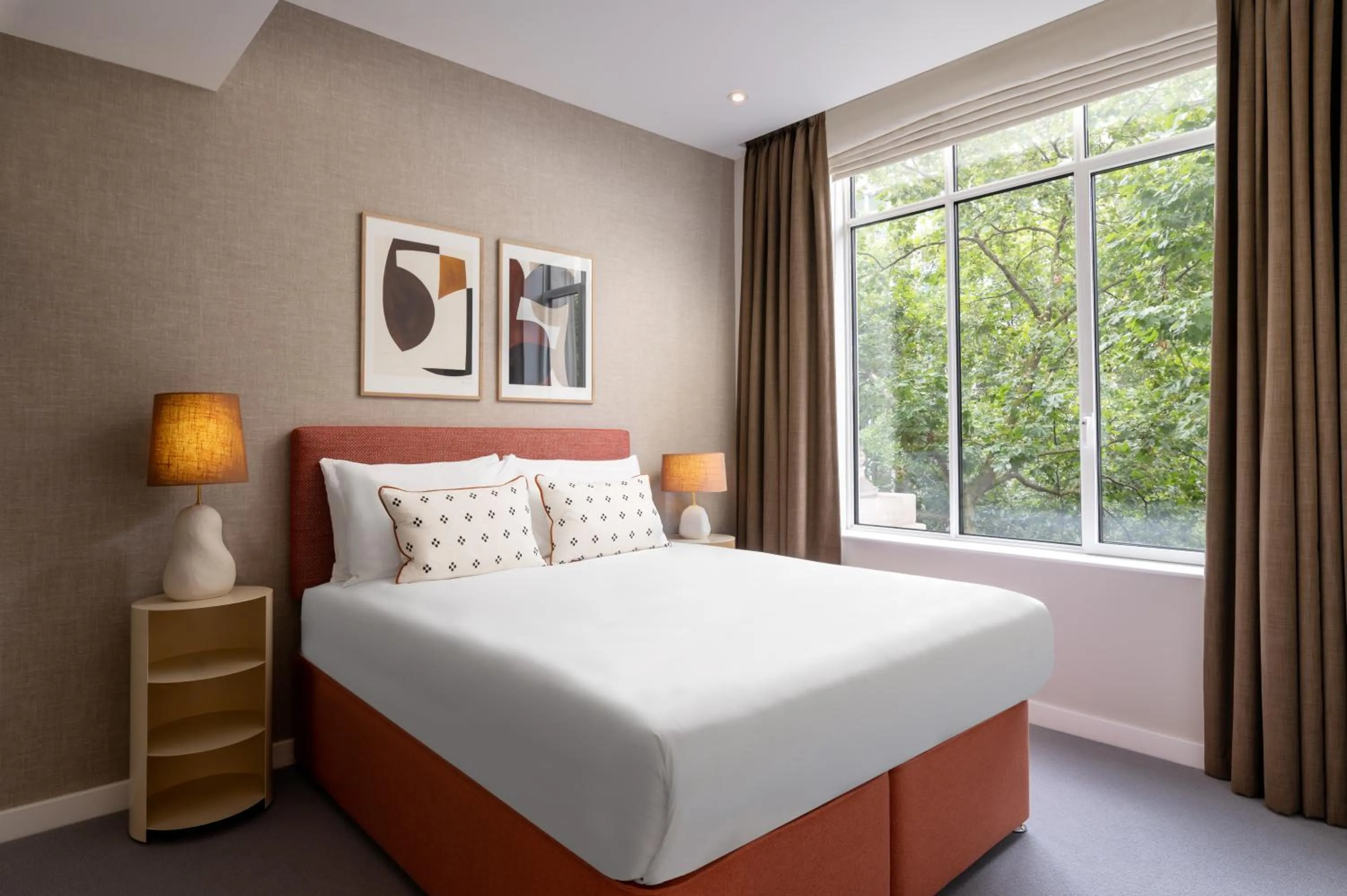 Bed in The Lincoln Suites