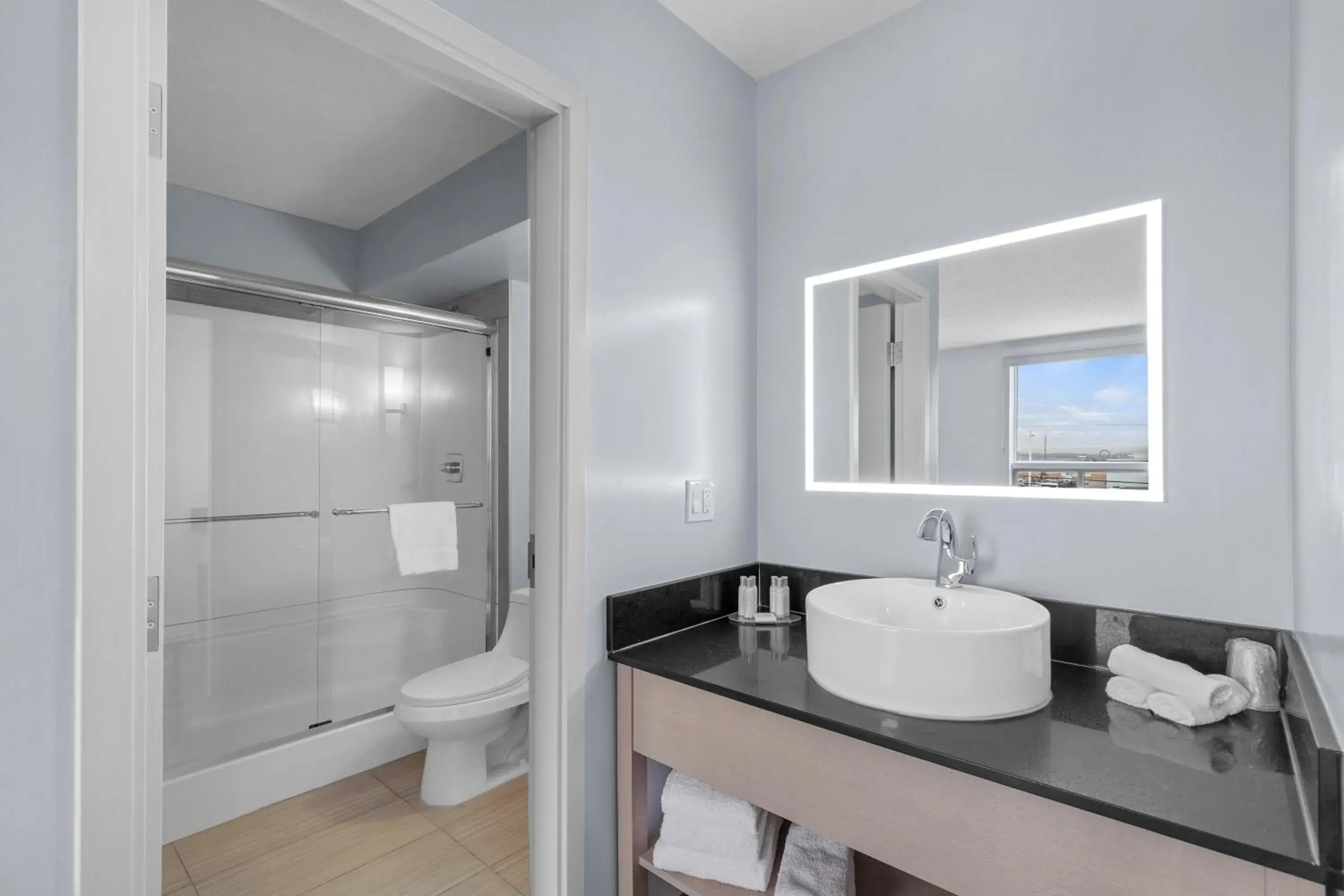 Bathroom in Emerald Hotel & Suites Calgary Airport Bathroom in Emerald Hotel & Suites Calgary Airport