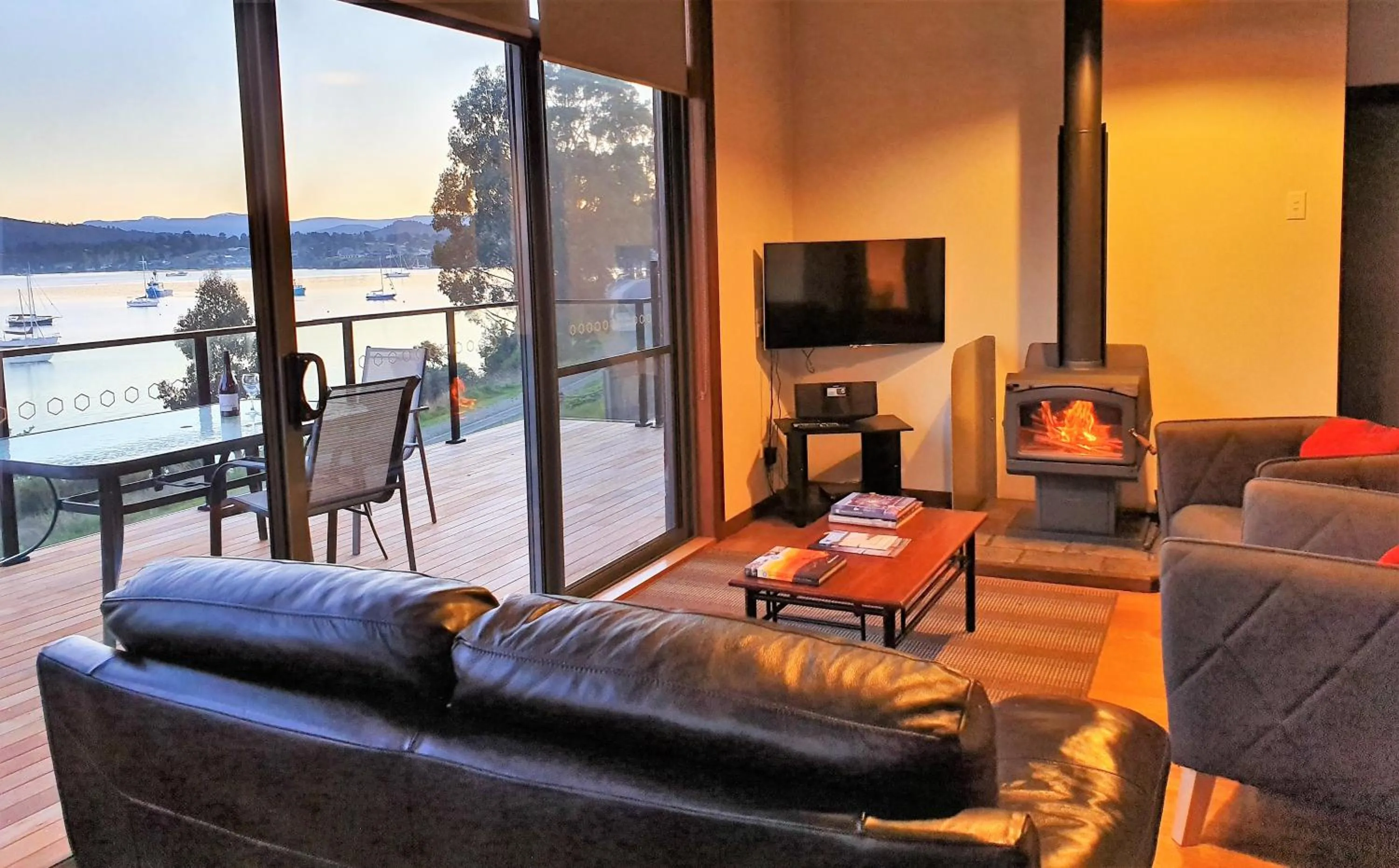 Balcony/Terrace in The Beach House- private jacuzzi and wood fire!