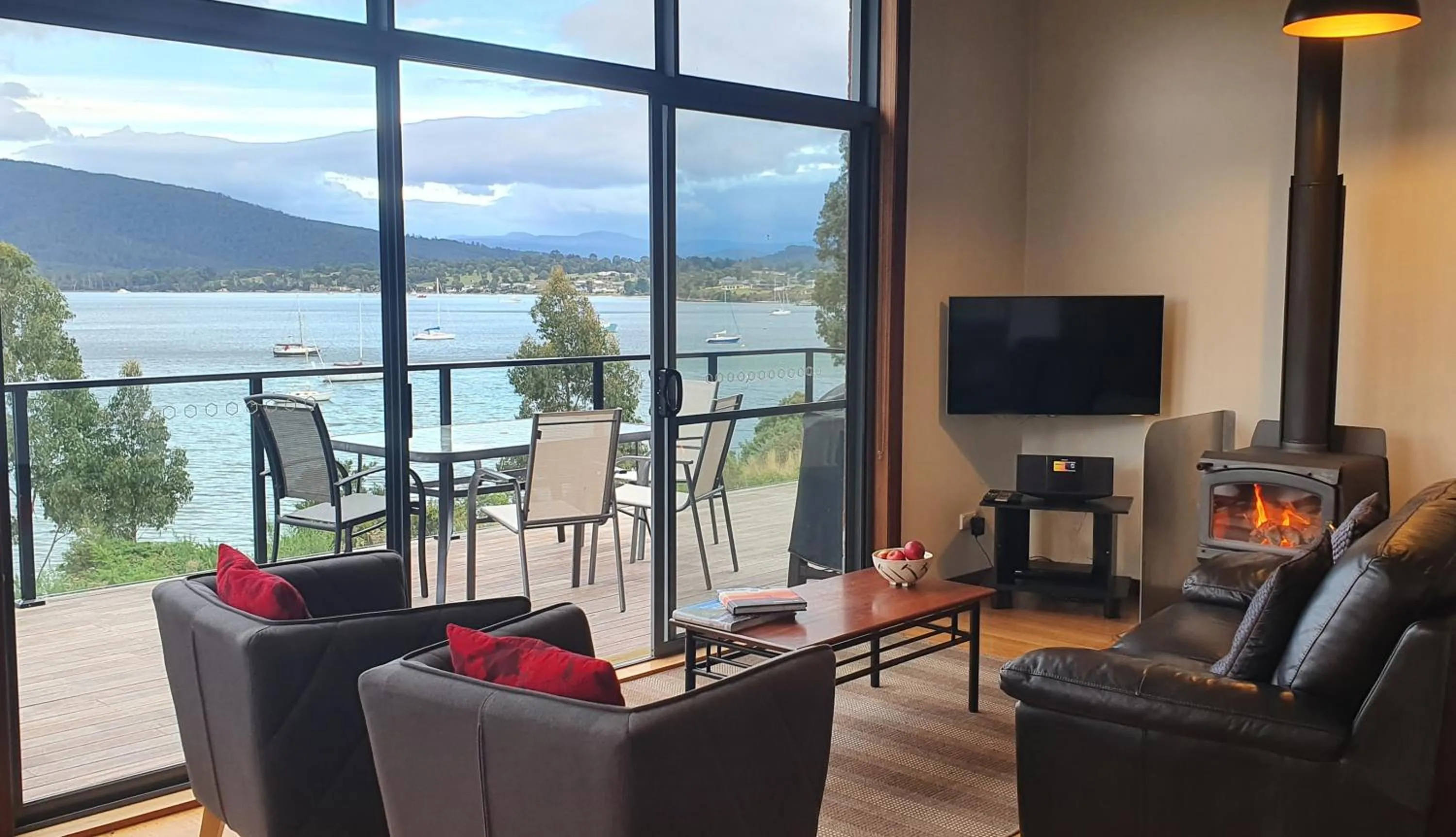Balcony/Terrace in The Beach House- private jacuzzi and wood fire!