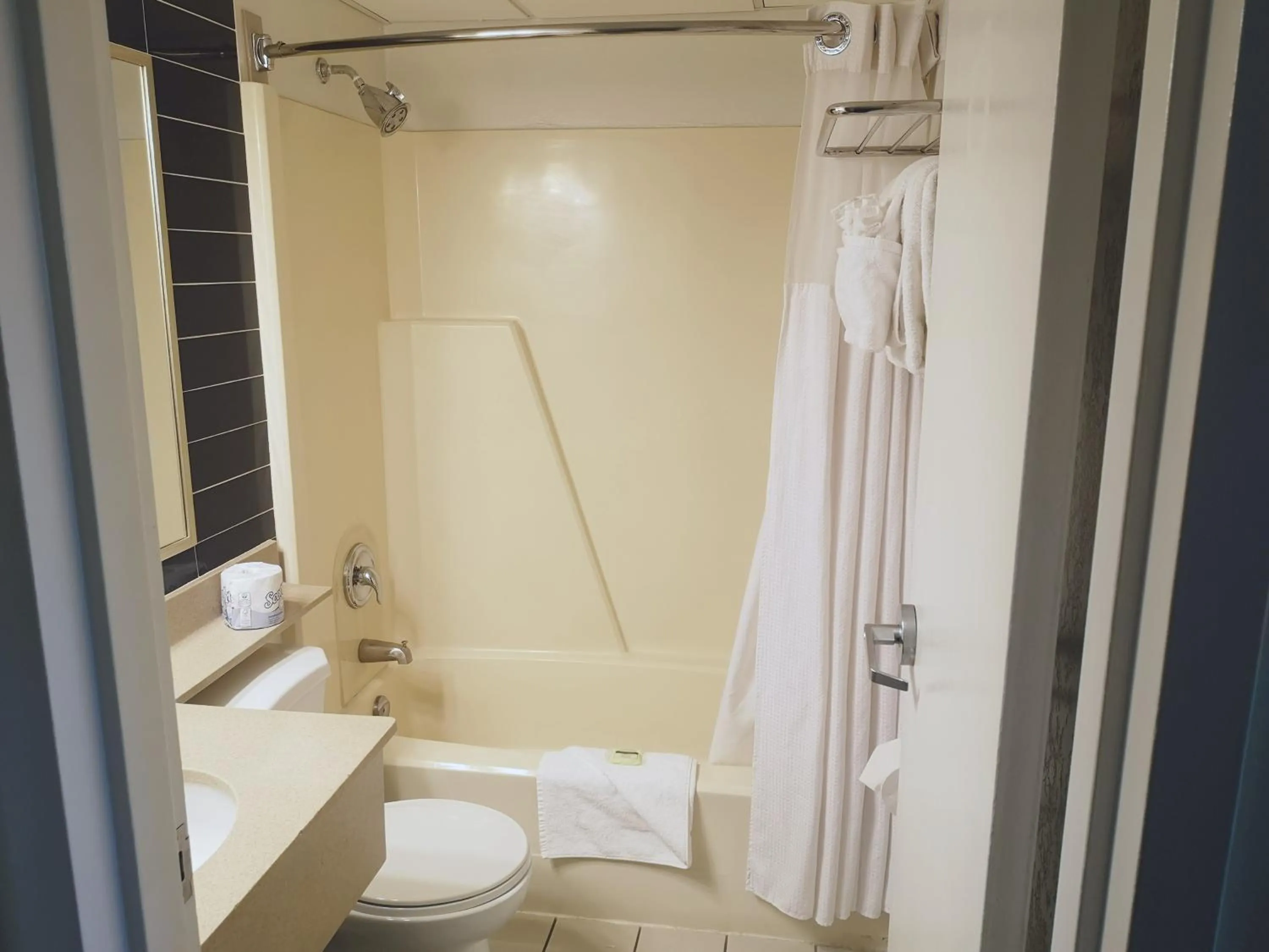 Bathroom in Travelodge by Wyndham Edmonton West