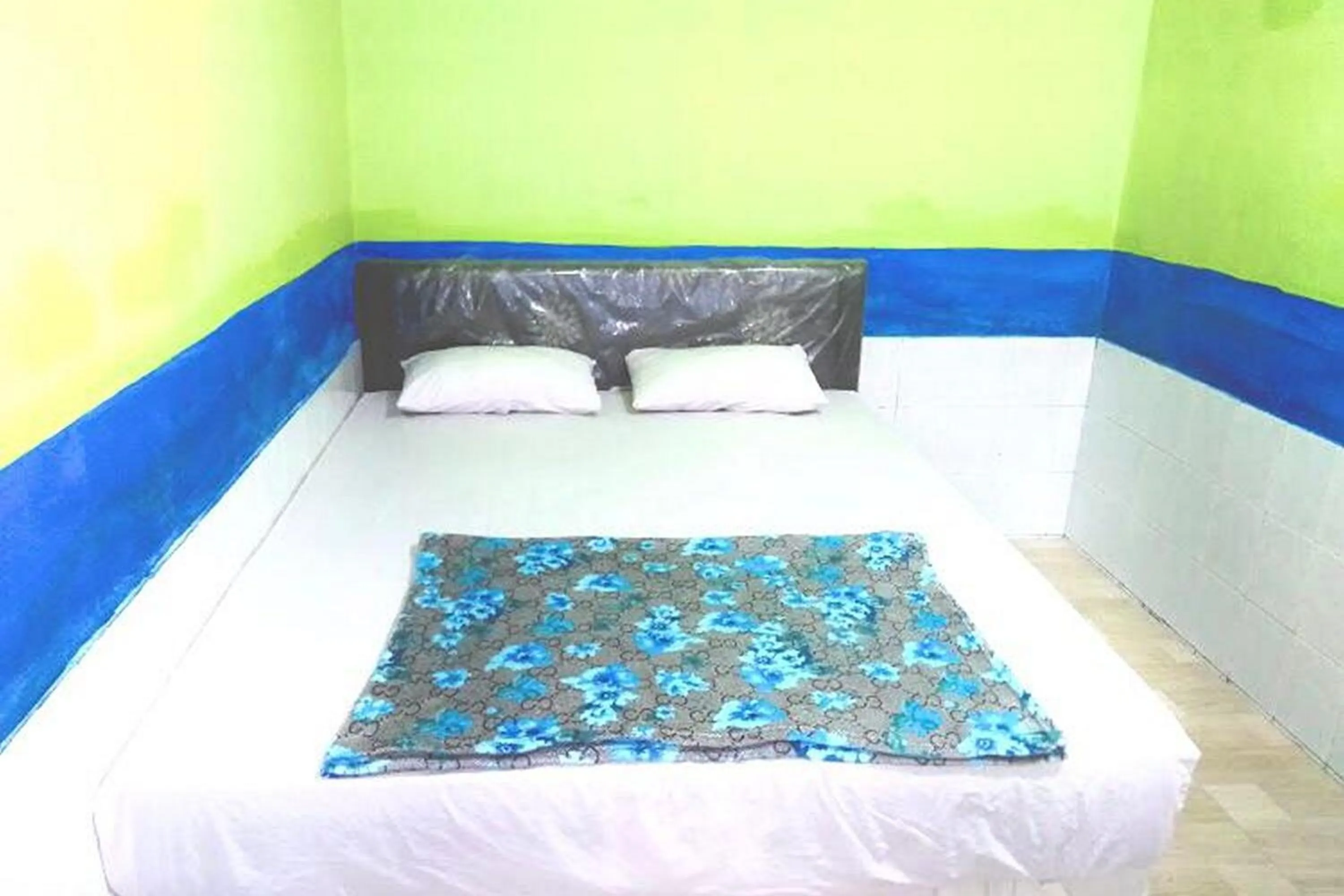 Bed in Hotel Indah Grogot Syariah Mitra RedDoorz