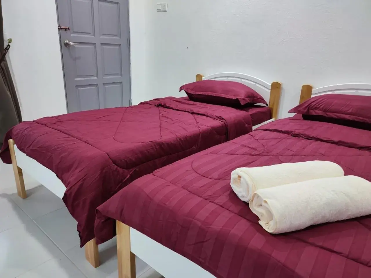 Bed in Kayangan Inn Bed in Kayangan Inn