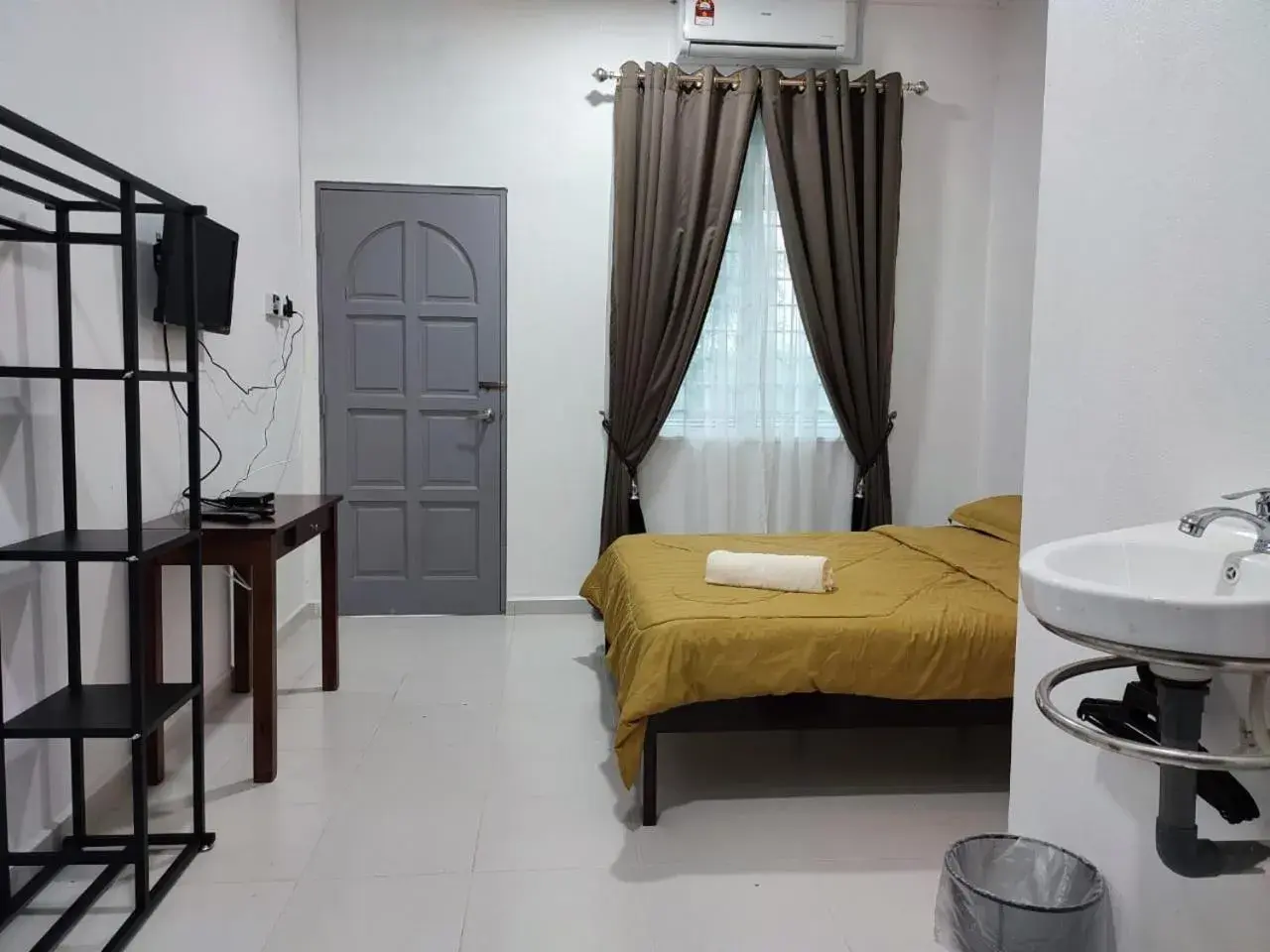 Bed in Kayangan Inn Bed in Kayangan Inn