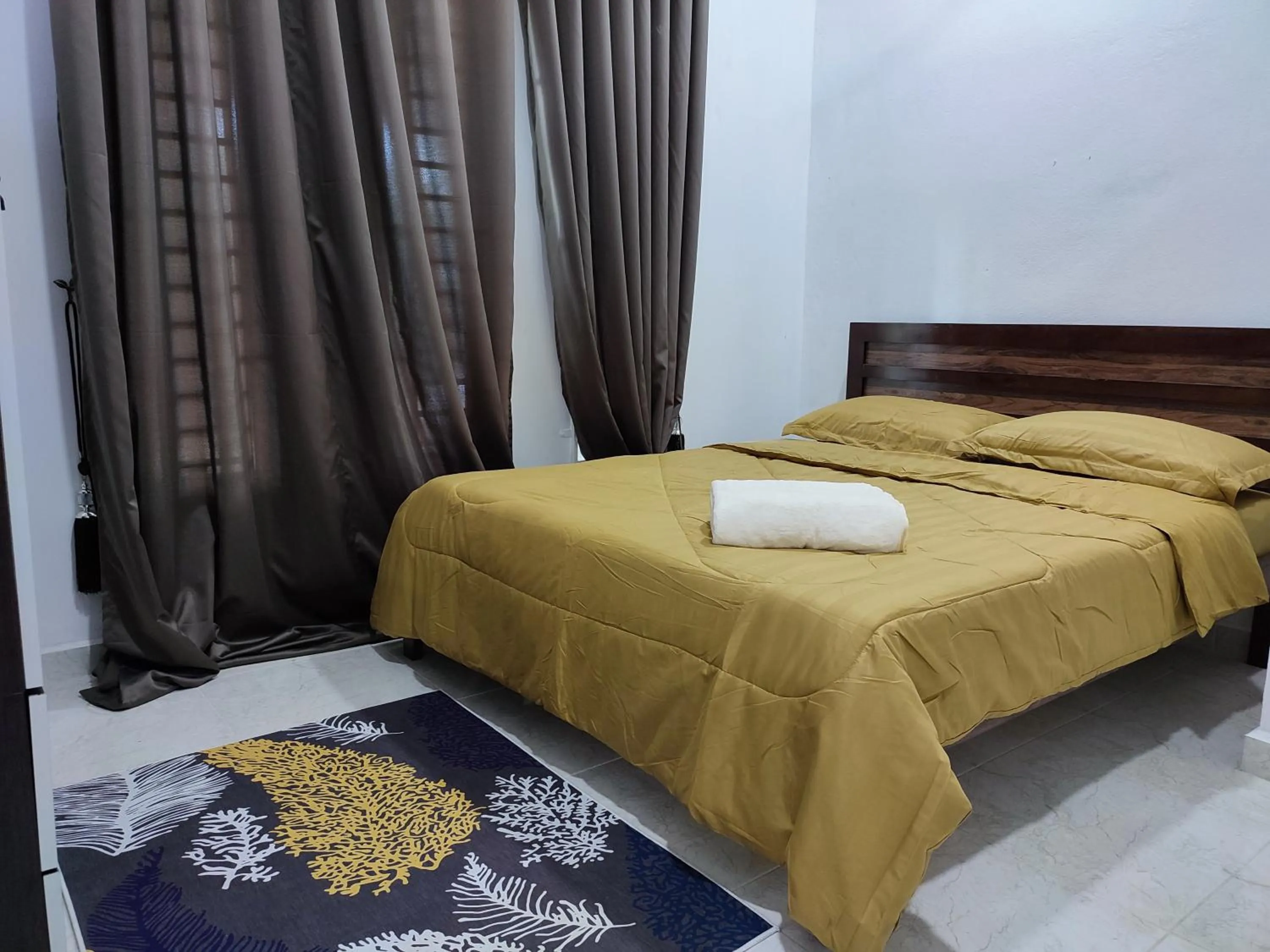 Bed in Kayangan Inn