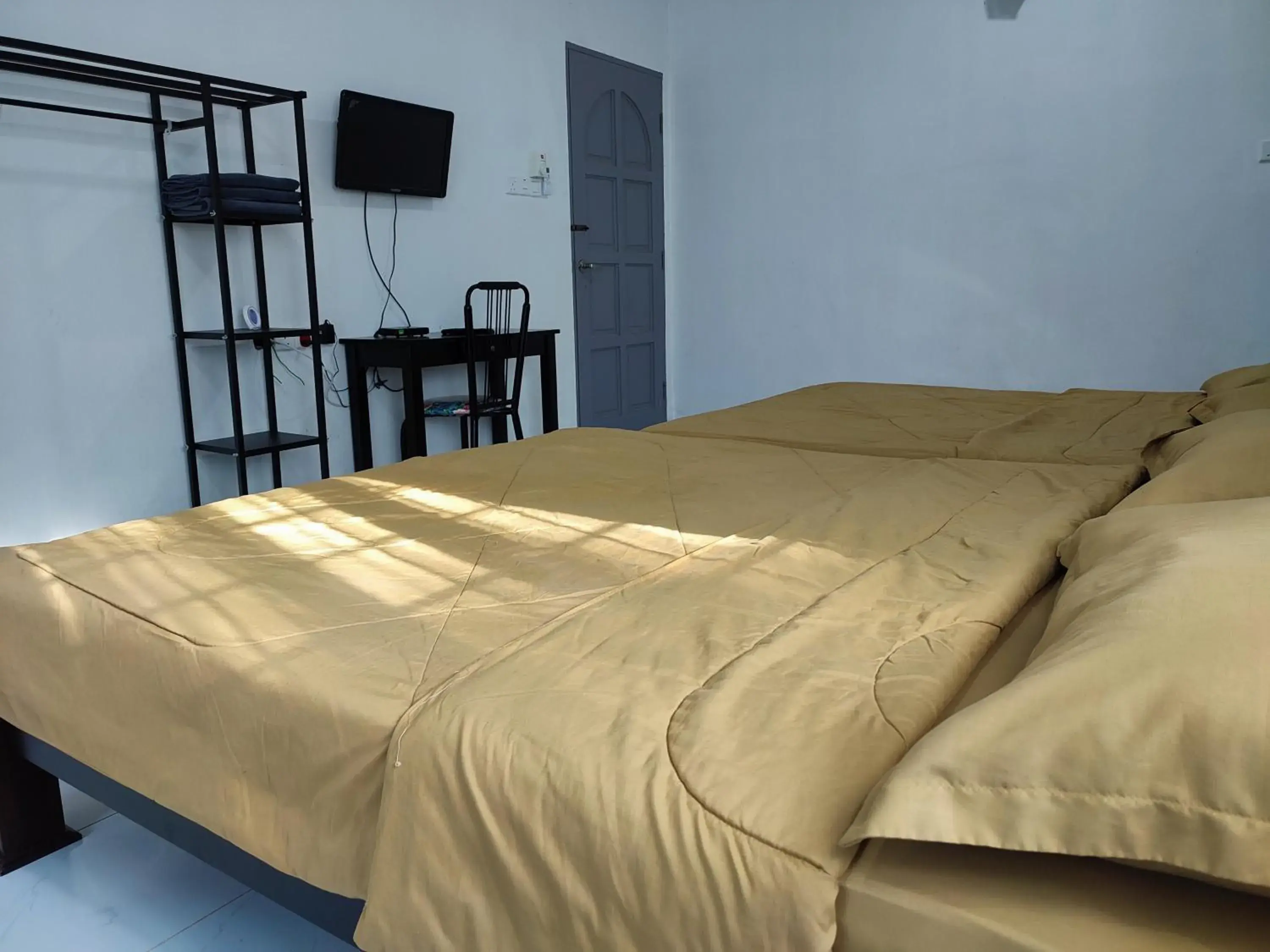 Bed in Kayangan Inn Bed in Kayangan Inn