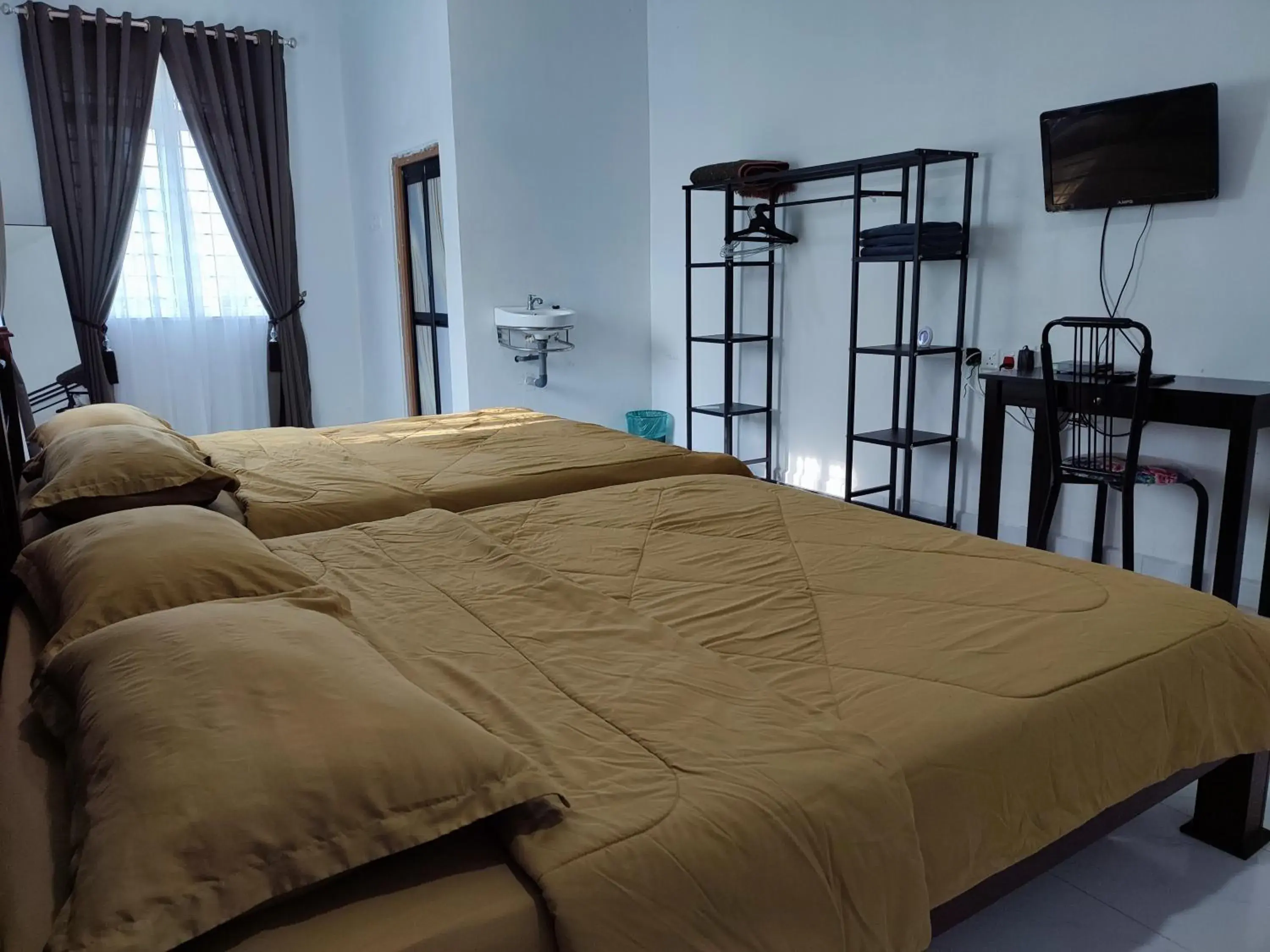 Bed in Kayangan Inn Bed in Kayangan Inn