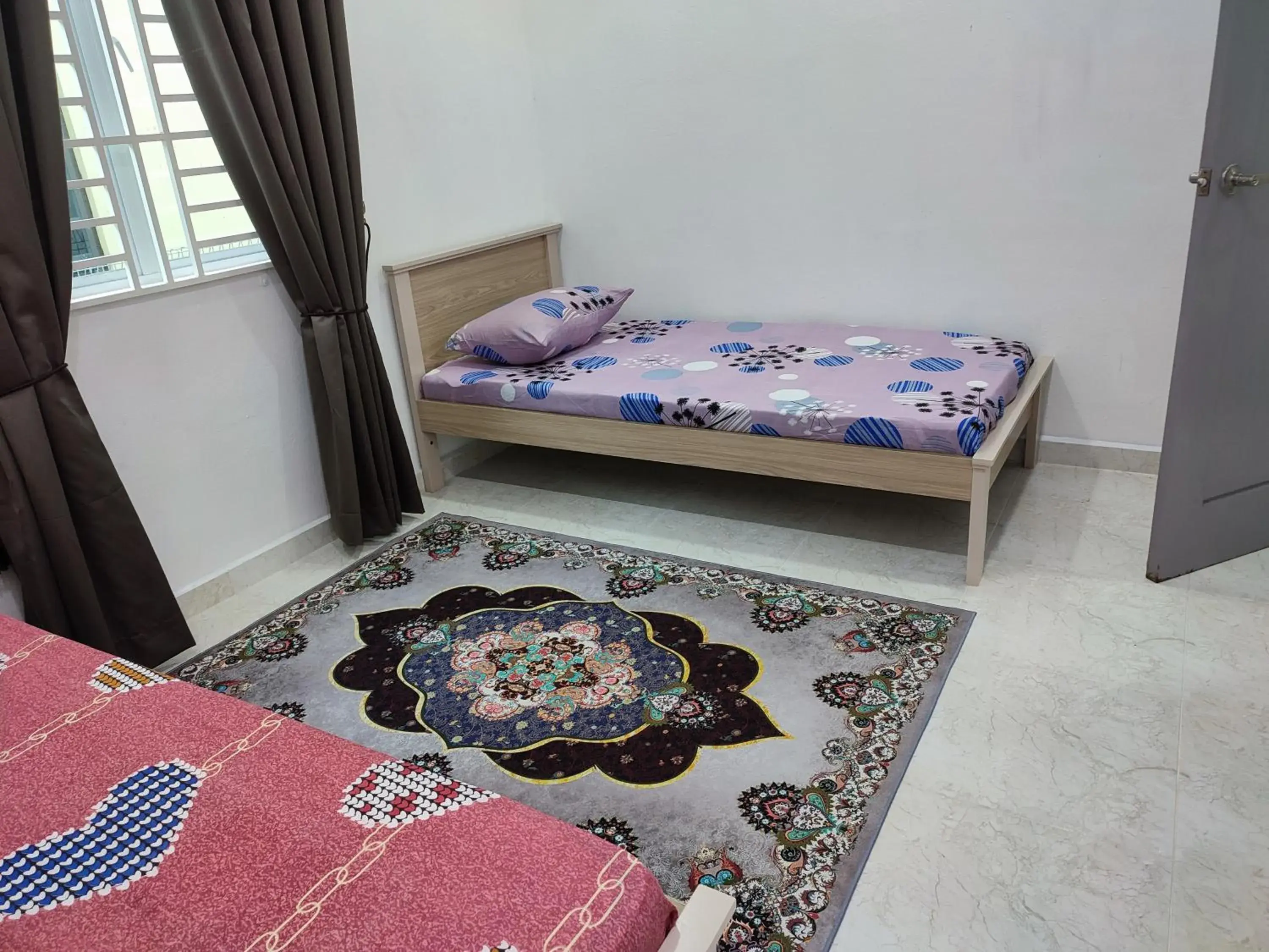 Bed in Kayangan Inn Bed in Kayangan Inn